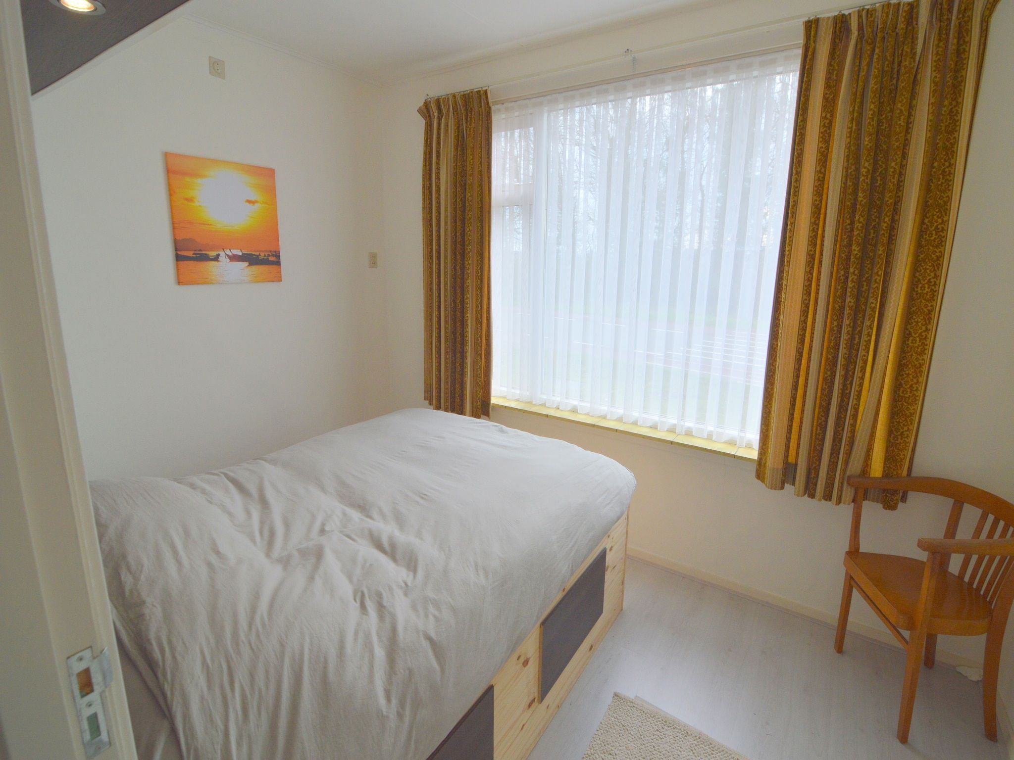 Een slaapkamer van Houck in Koewacht