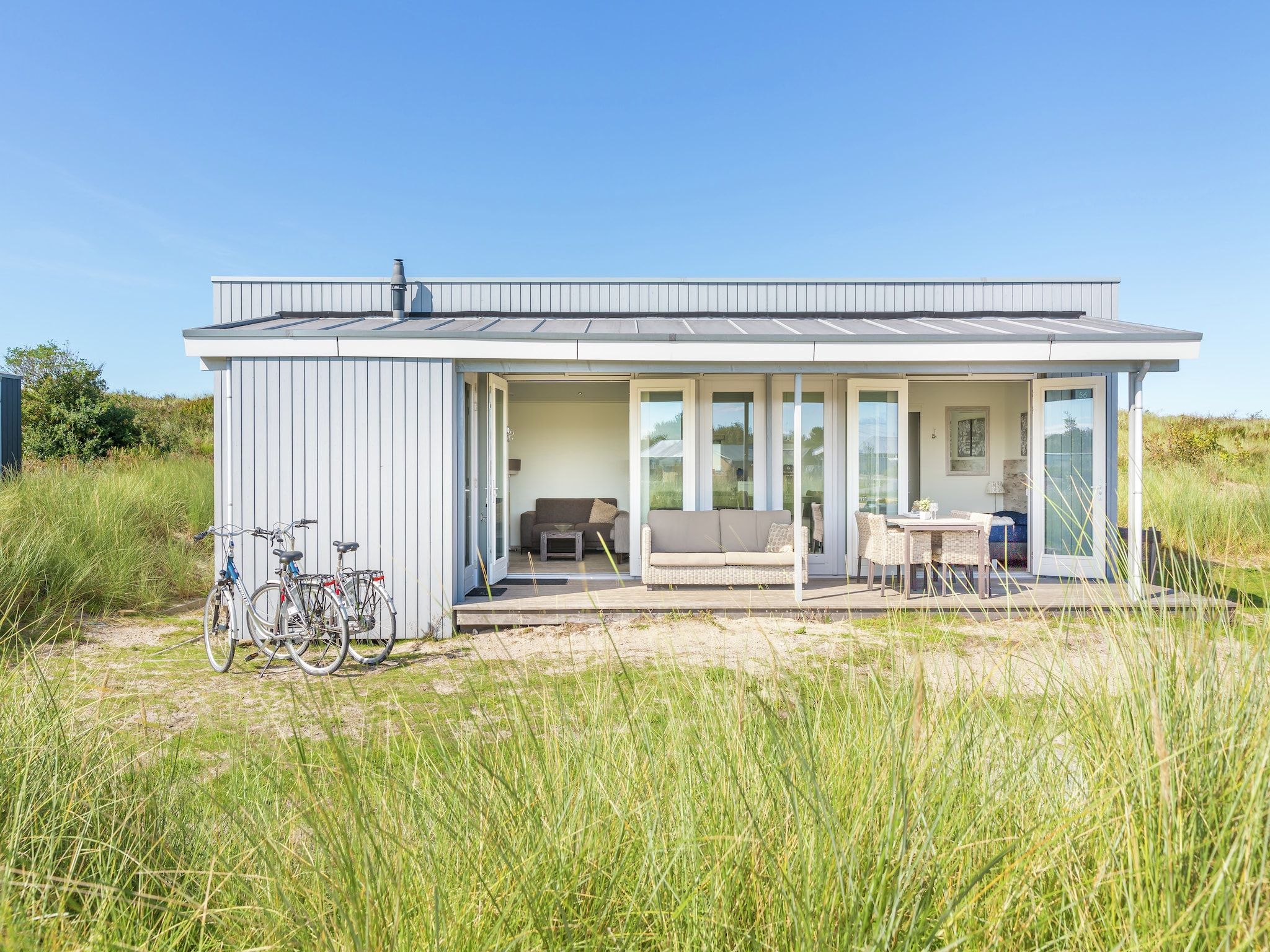 De buitenkant van Vakantiepark Boomhiemke 7 in Hollum-Ameland