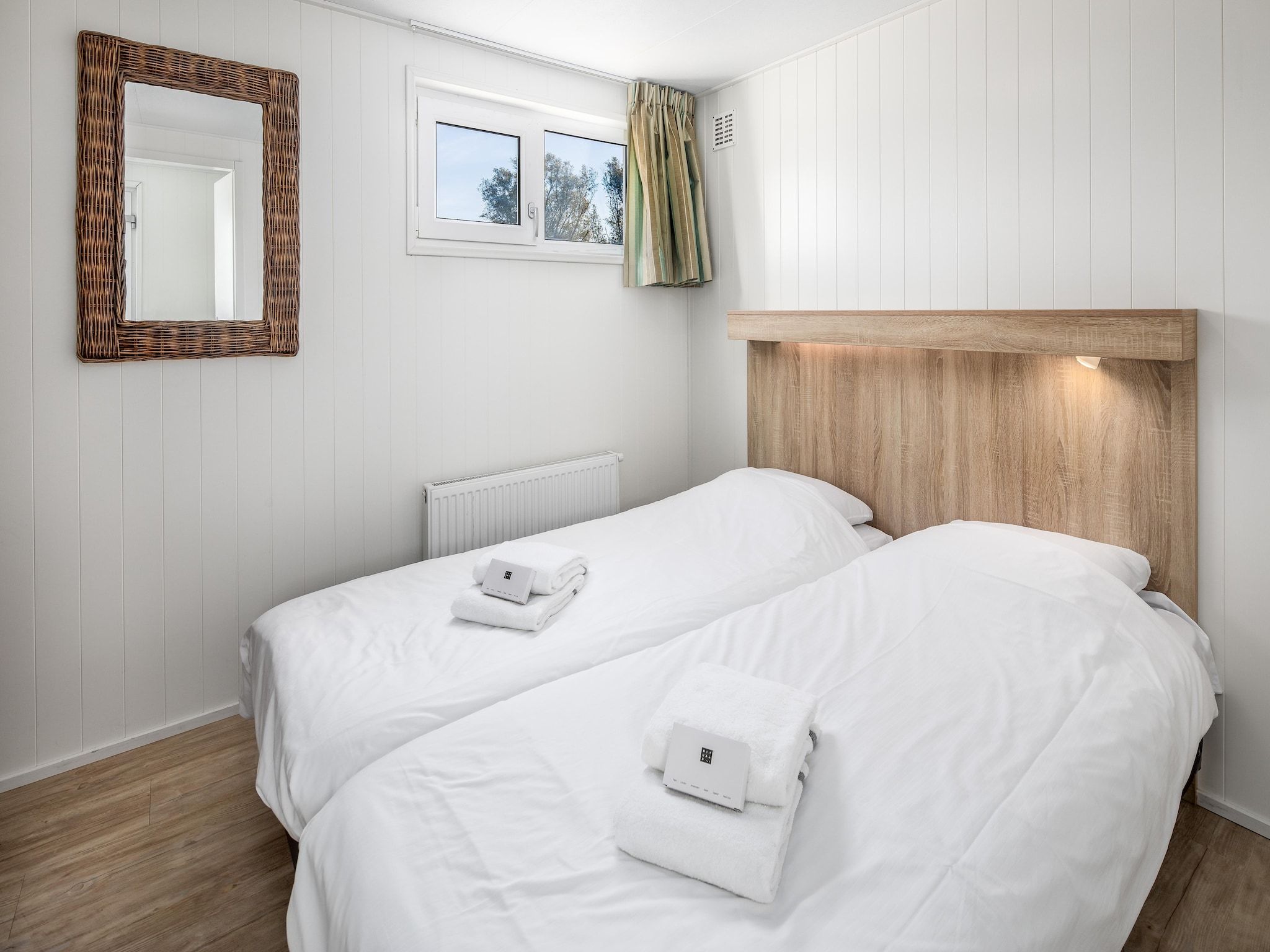 Een slaapkamer van Vakantiepark Beach Resort 6 in Kamperland