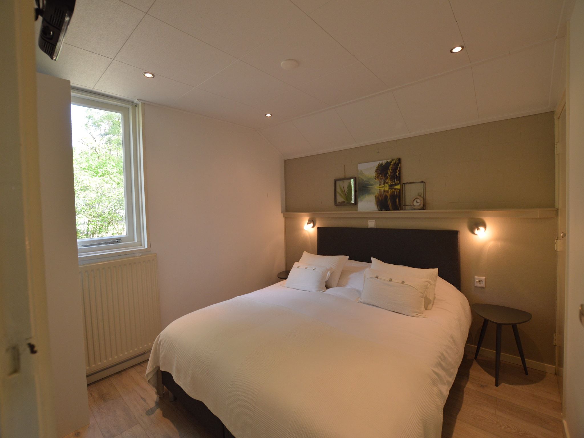 Een slaapkamer van Het Kleine Landgoed in Stramproy