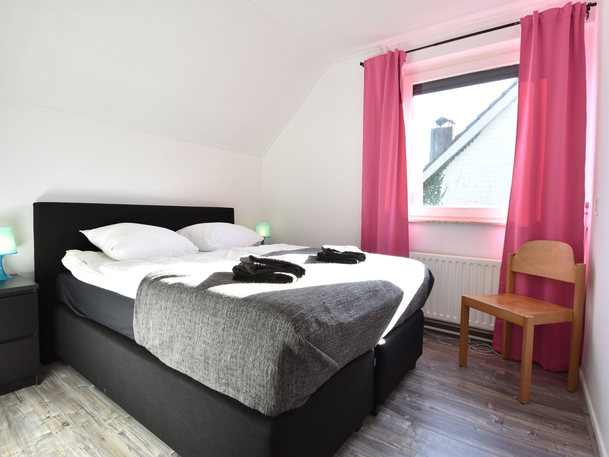 Een slaapkamer van Het Mosselhuys in Bruinisse