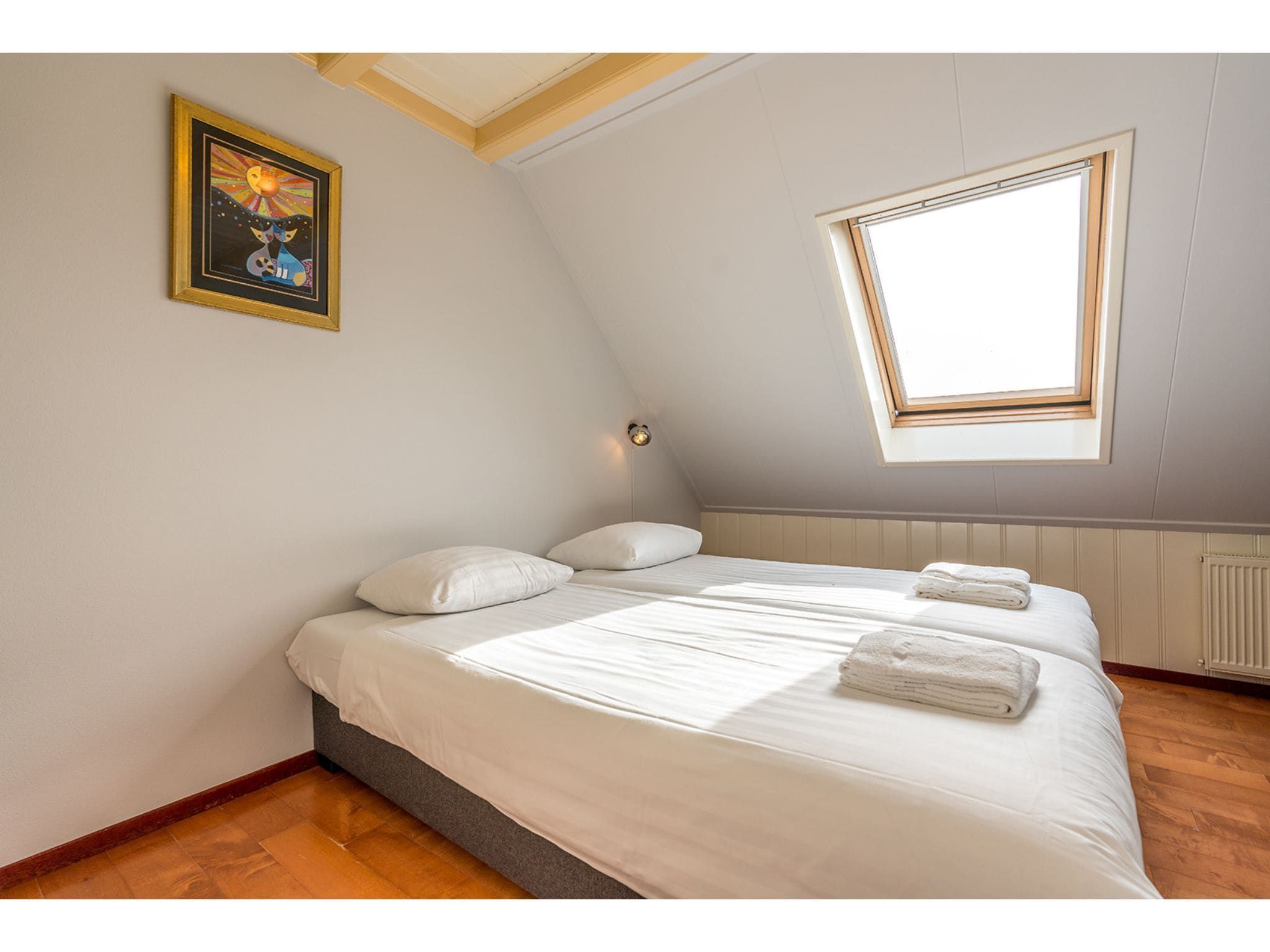 Een slaapkamer van Florijn 3 in Oost-Texel