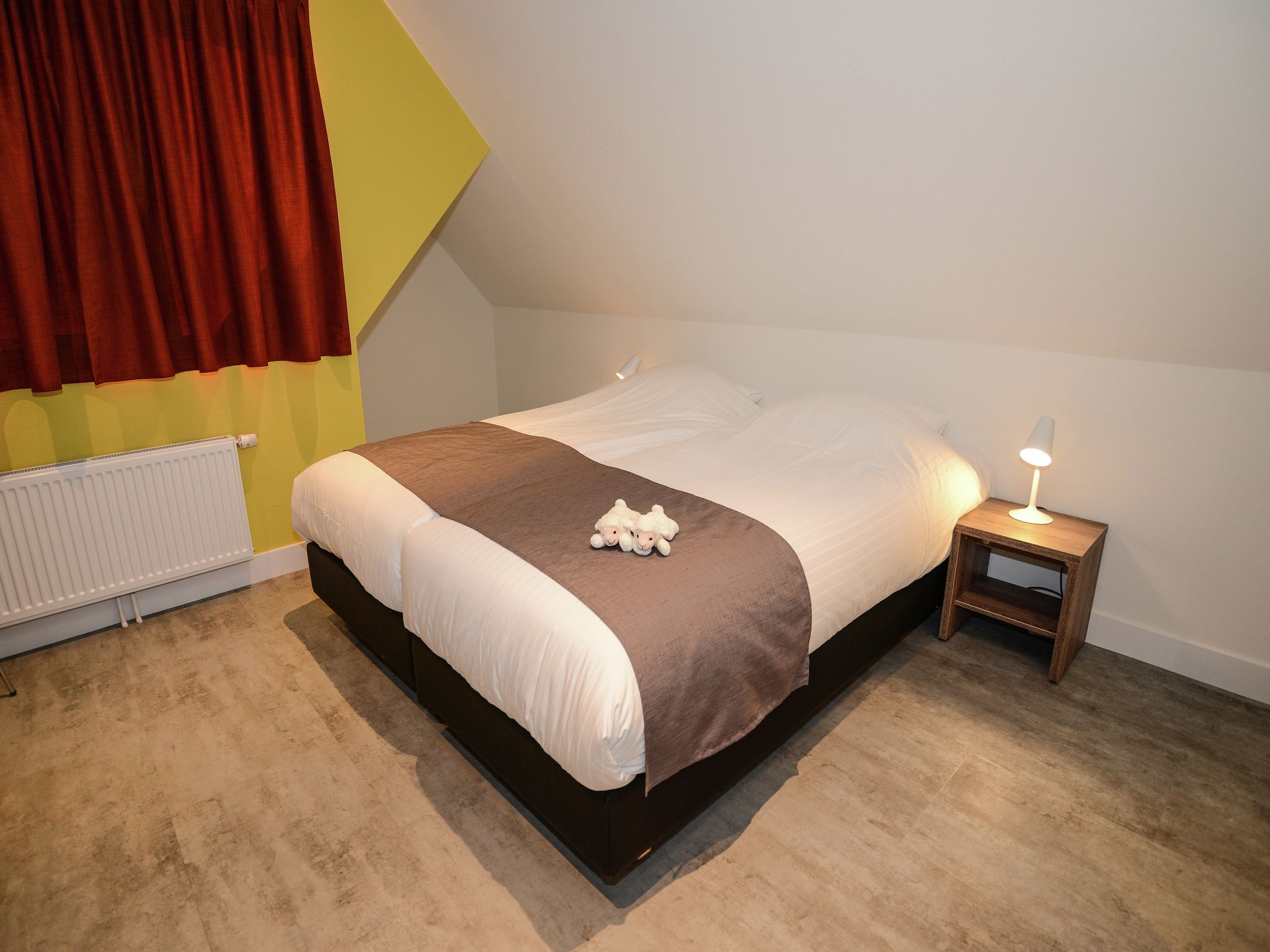 Een slaapkamer van Villa Hoogelandt 70 in De Koog-Texel
