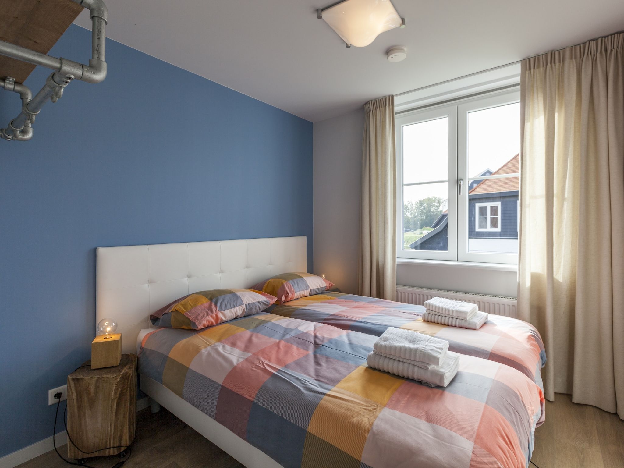 Een slaapkamer van Villa Zandduin in Cadzand