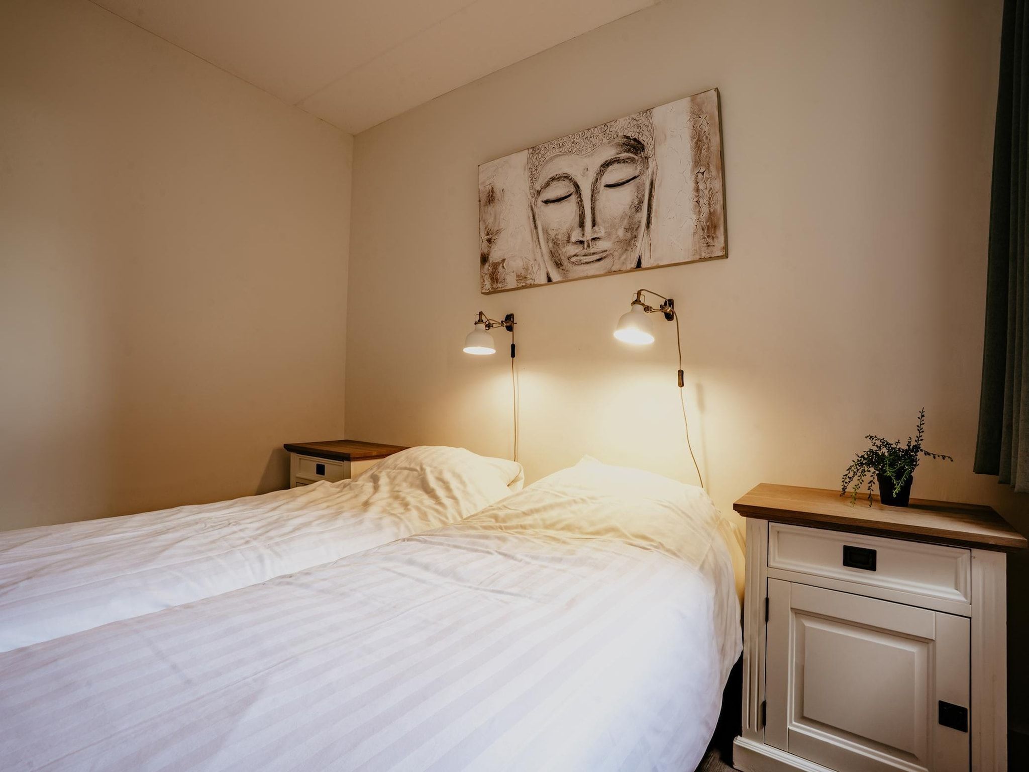 Een slaapkamer van Waterpark de Meerparel  1 in Uitgeest