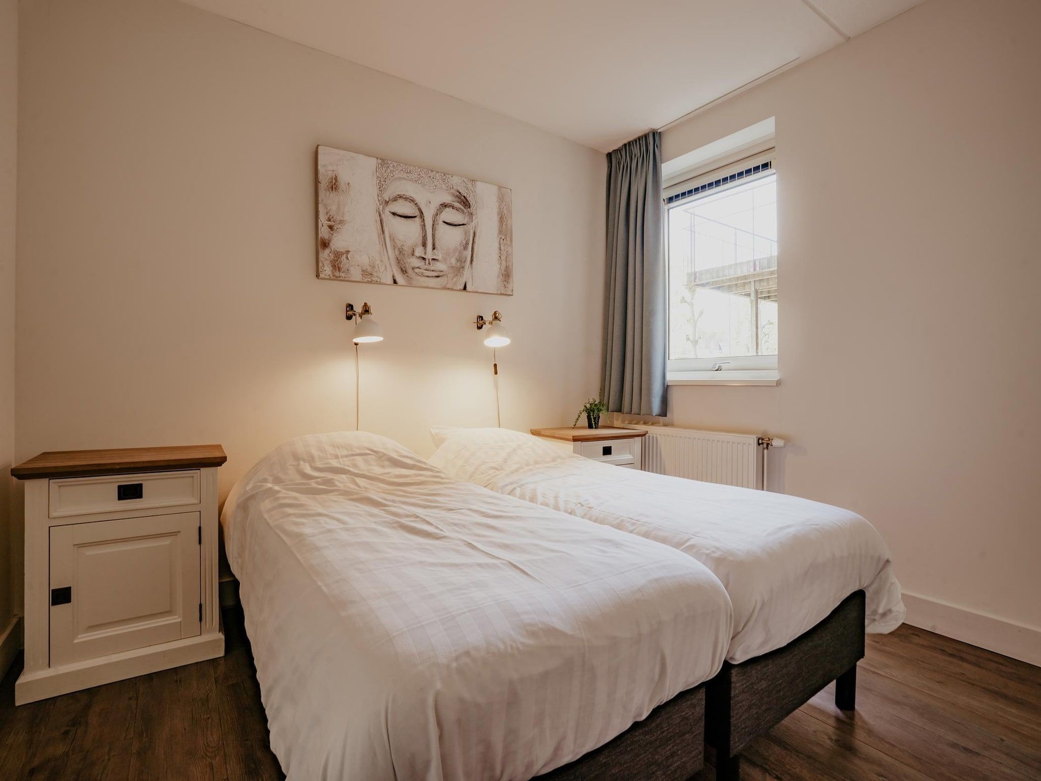 Een slaapkamer van Waterpark de Meerparel 8 in Uitgeest