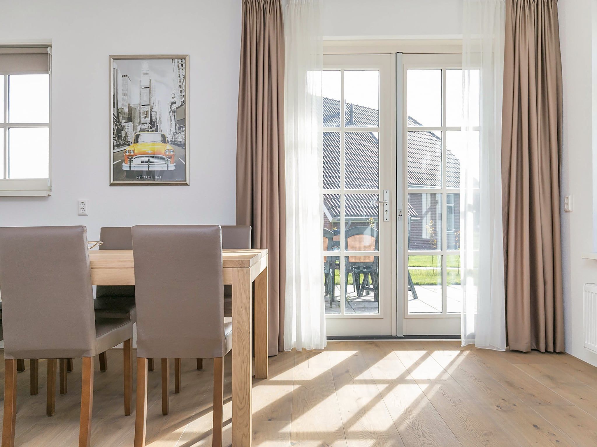 De woonkamer van Villaparc Schoonhovenseland in Hollandscheveld