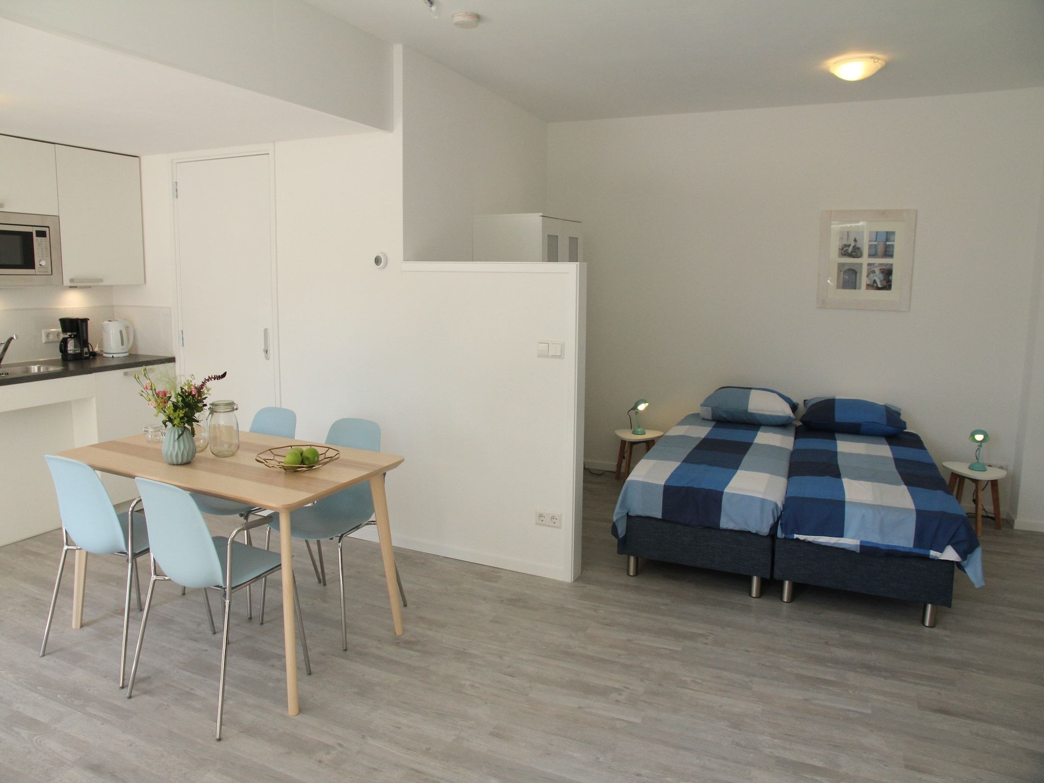 Een slaapkamer van De Beukelaar 2pers in Schoorl