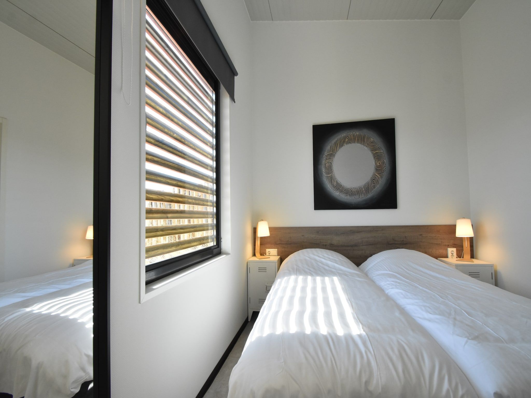Een slaapkamer van Quality Lodge aan de Duinen in Callantsoog