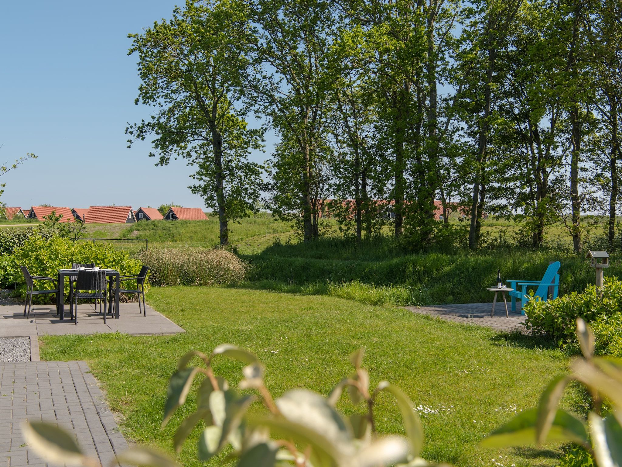 De tuin van Water Resort Oosterschelde 91 in Wemeldinge