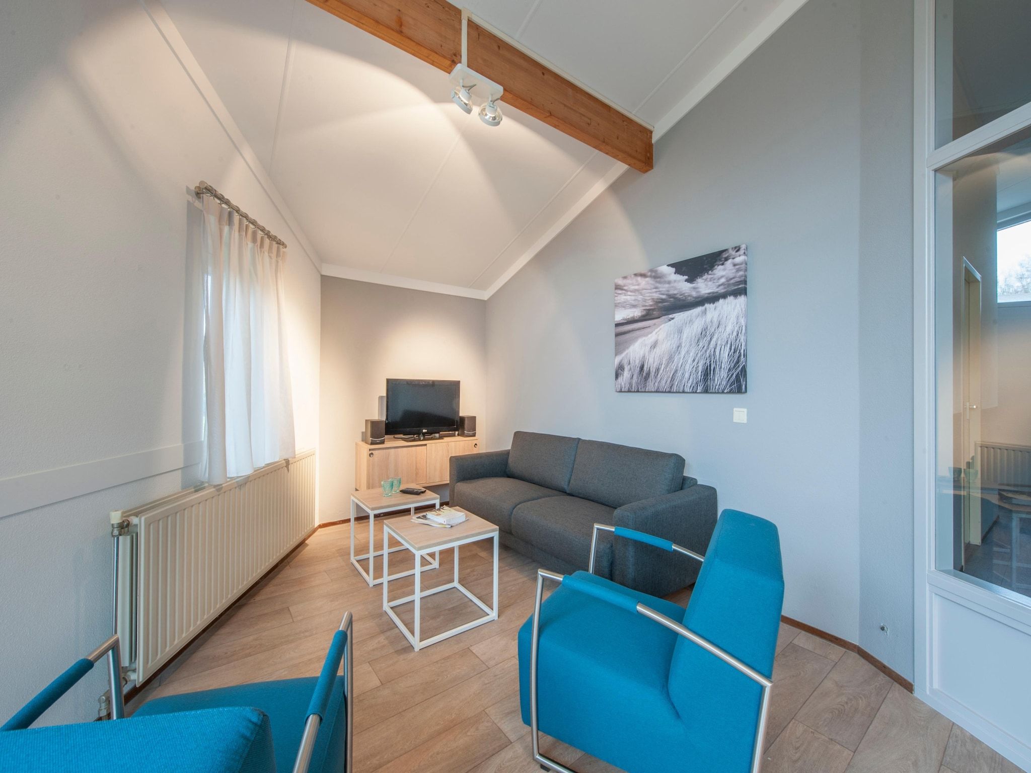 De woonkamer van Vakantiepark Hof Domburg 11 in Domburg