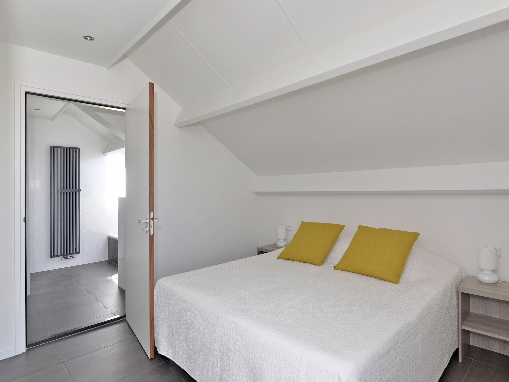 Een slaapkamer van Penthouse XXL 4ab in Kamperland