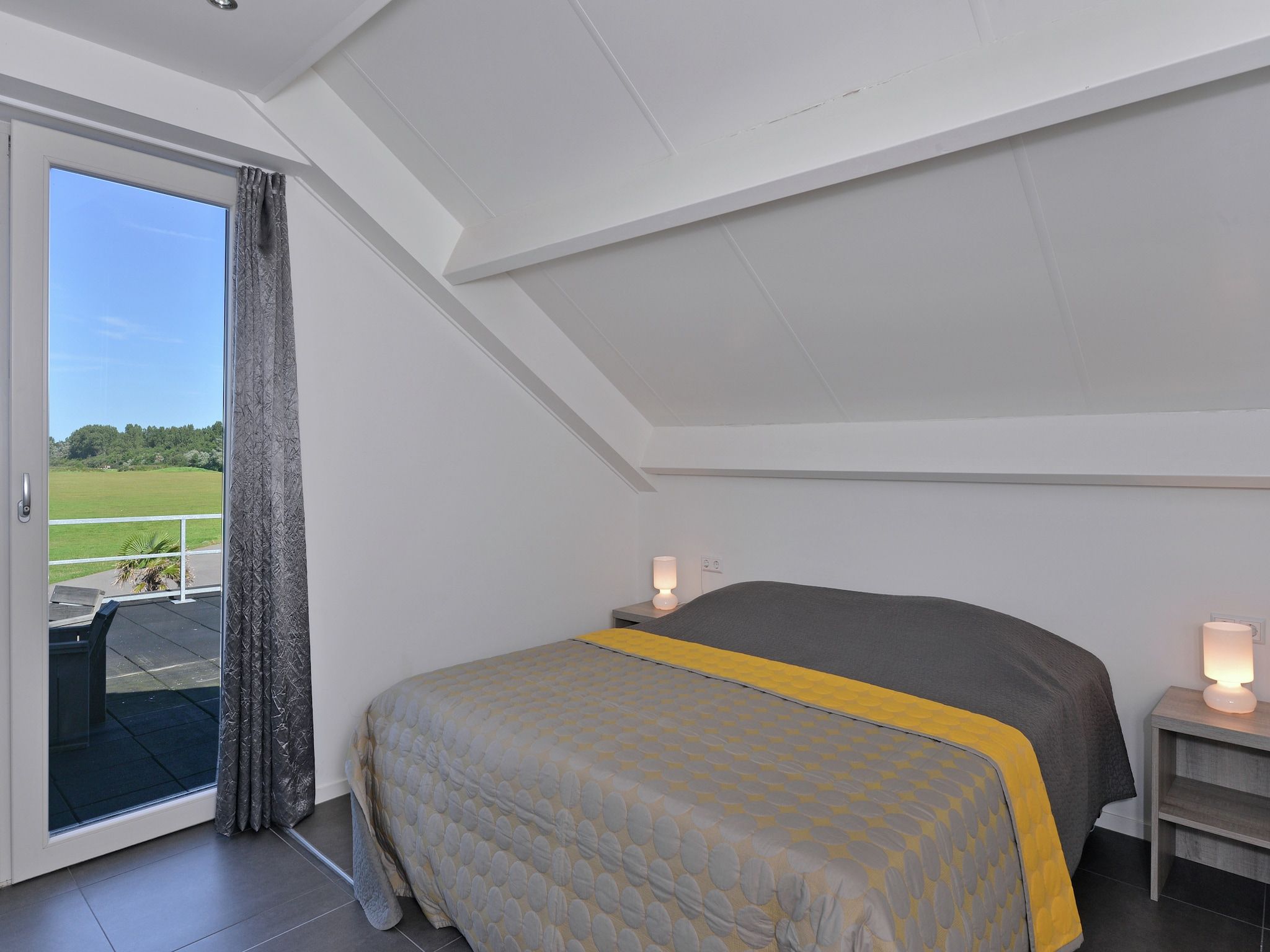 Een slaapkamer van Appartement 4b - Schotsman Watersport in Kamperland