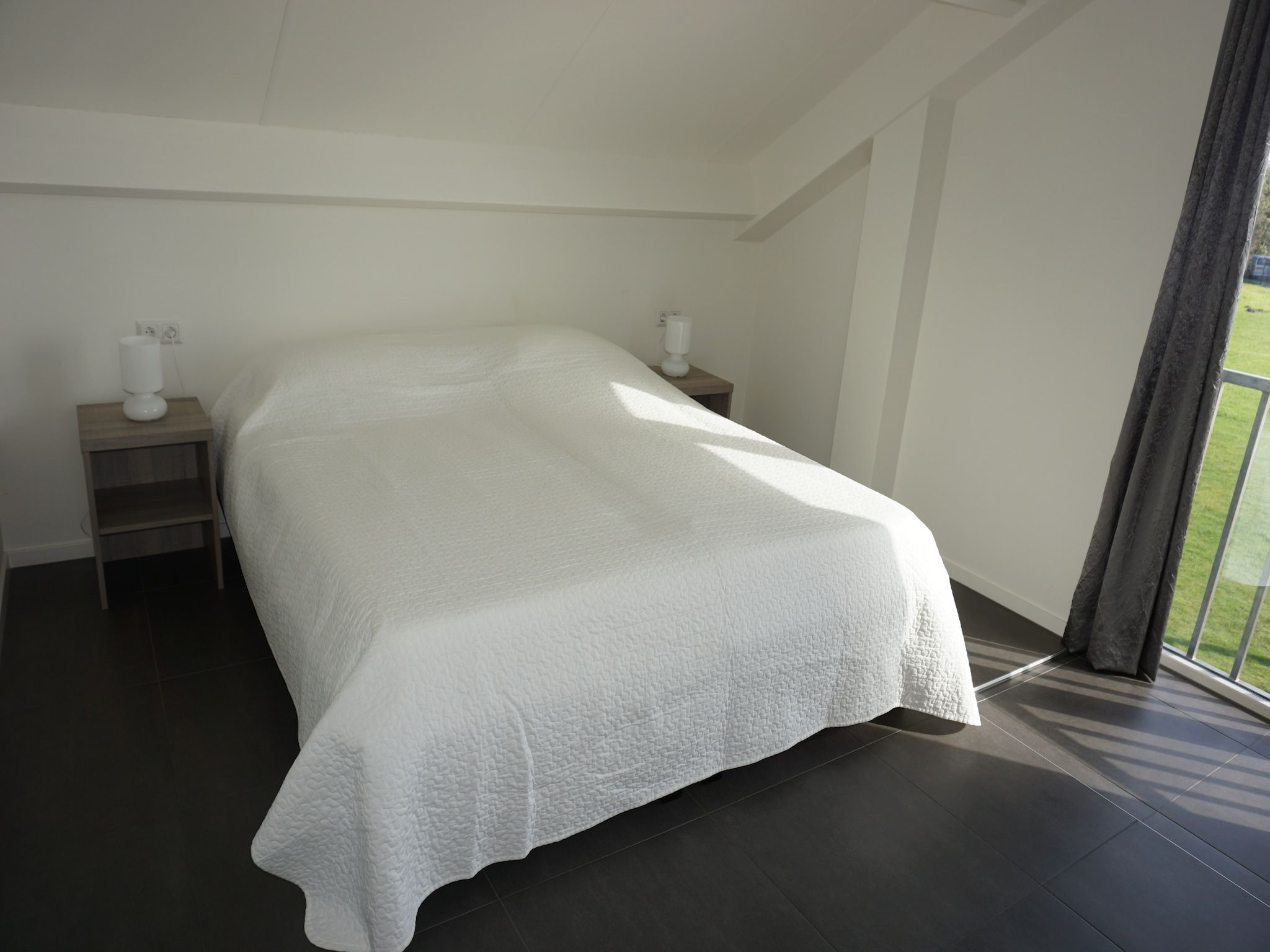 Een slaapkamer van Appartement 4b - Schotsman Watersport in Kamperland