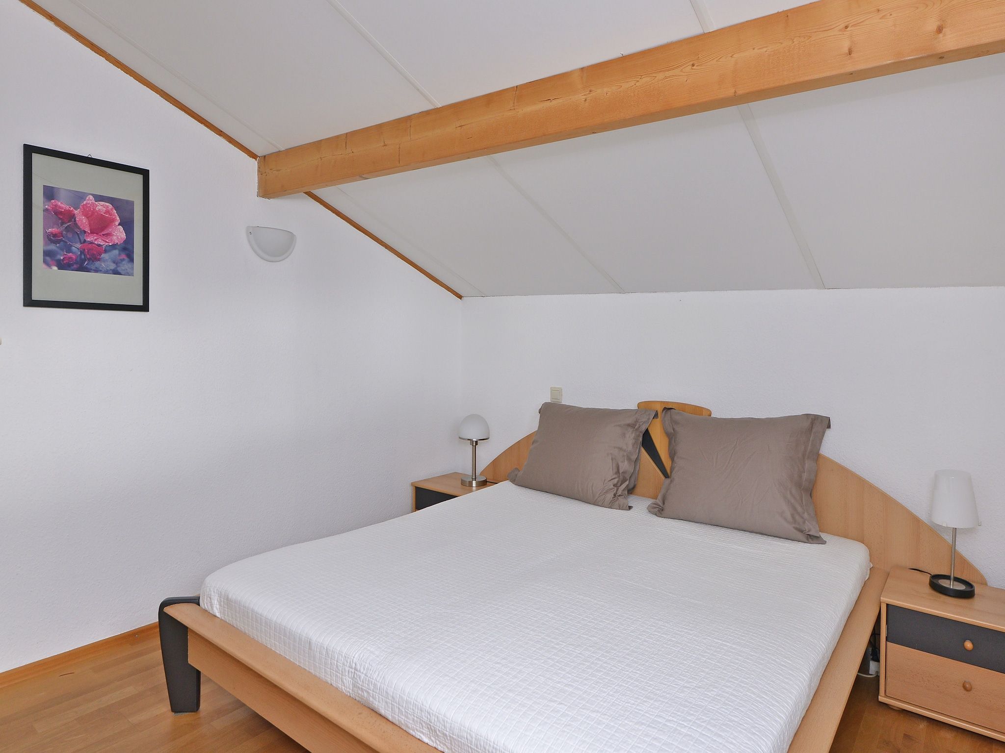 Een slaapkamer van Cederlaan 8 in Kamperland