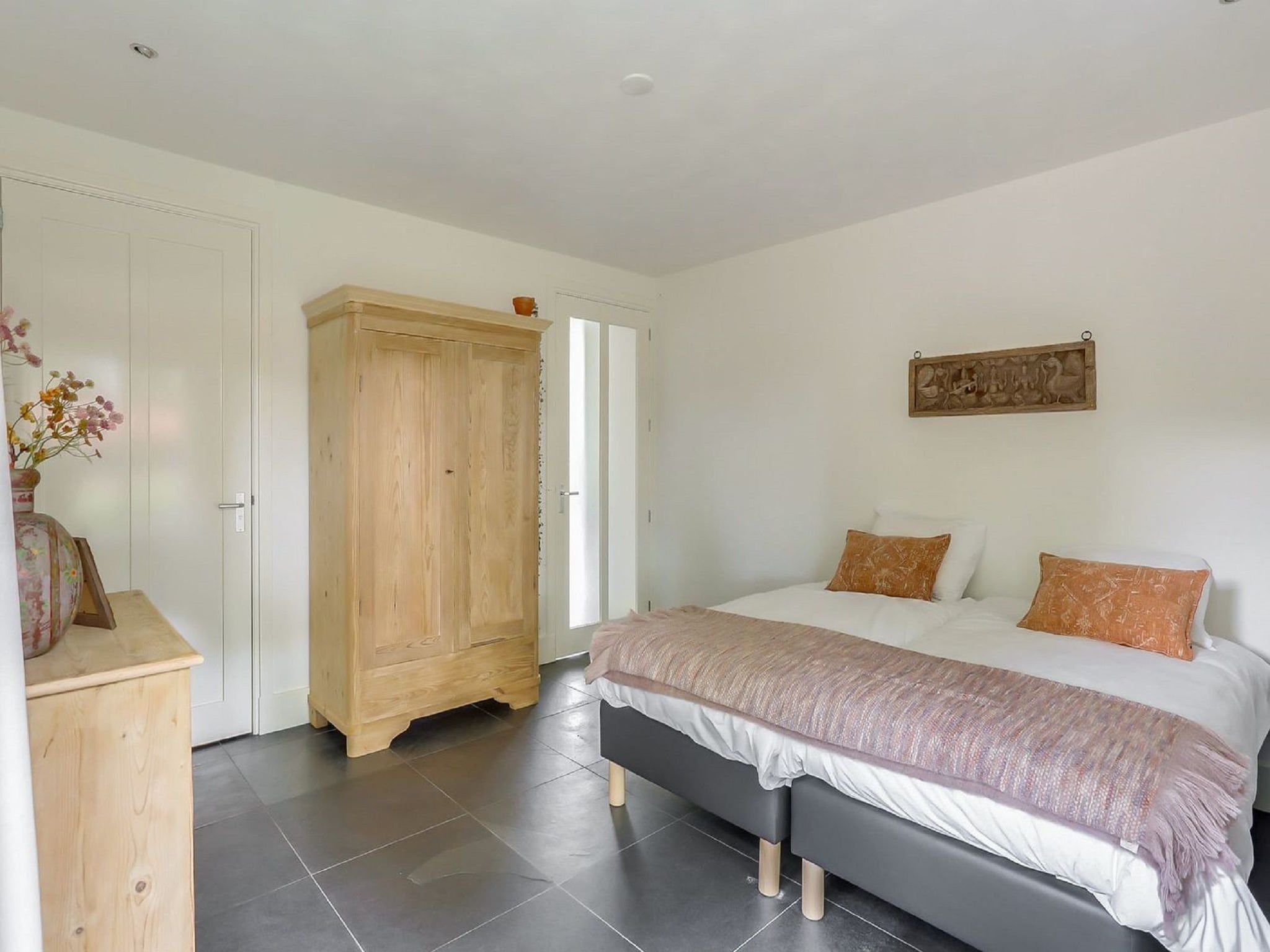 Een slaapkamer van Vakantiepark Sandberghe 7 in Uden