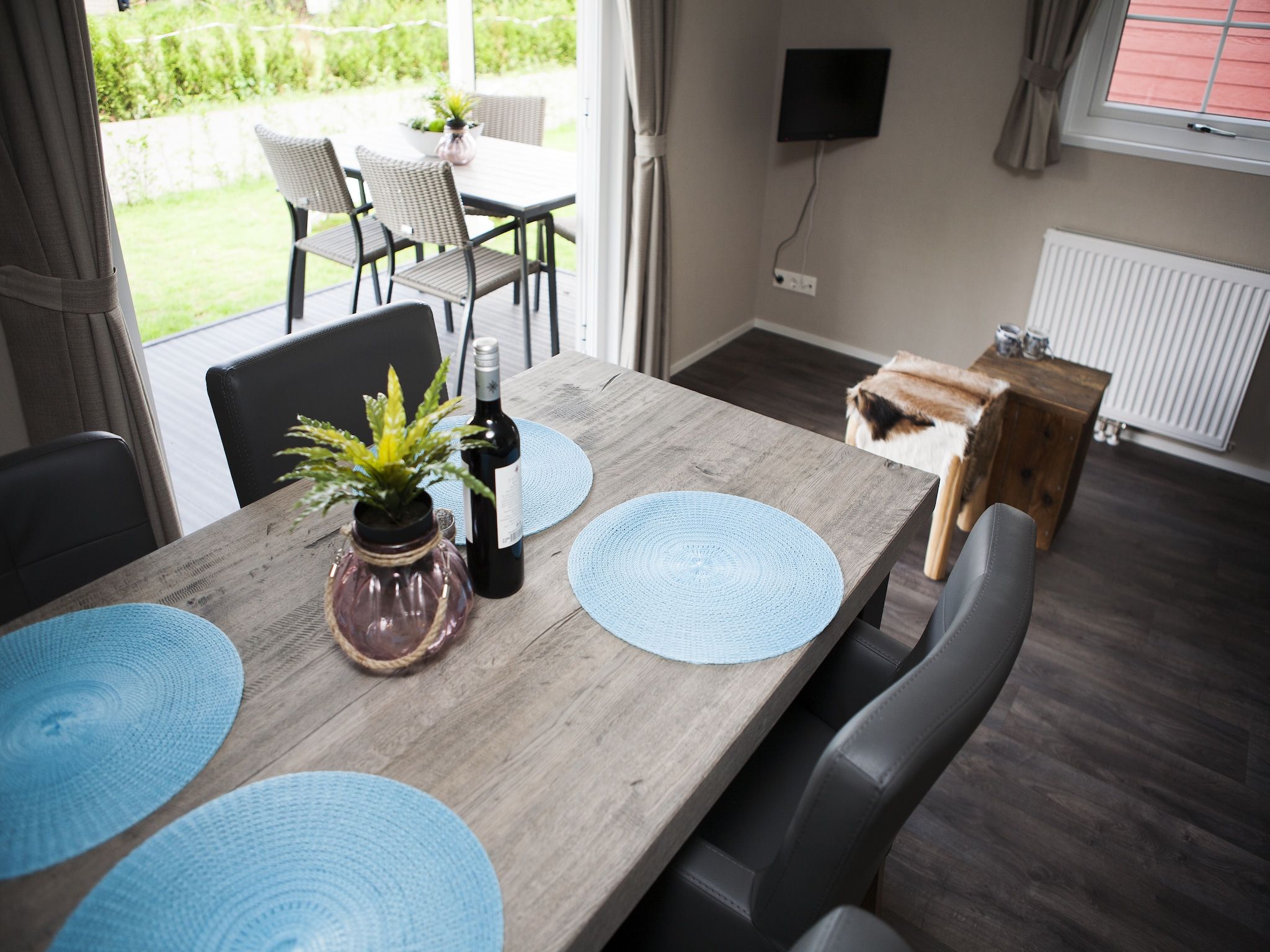 De woonkamer van Recreatiepark de Boshoek 6 in Voorthuizen