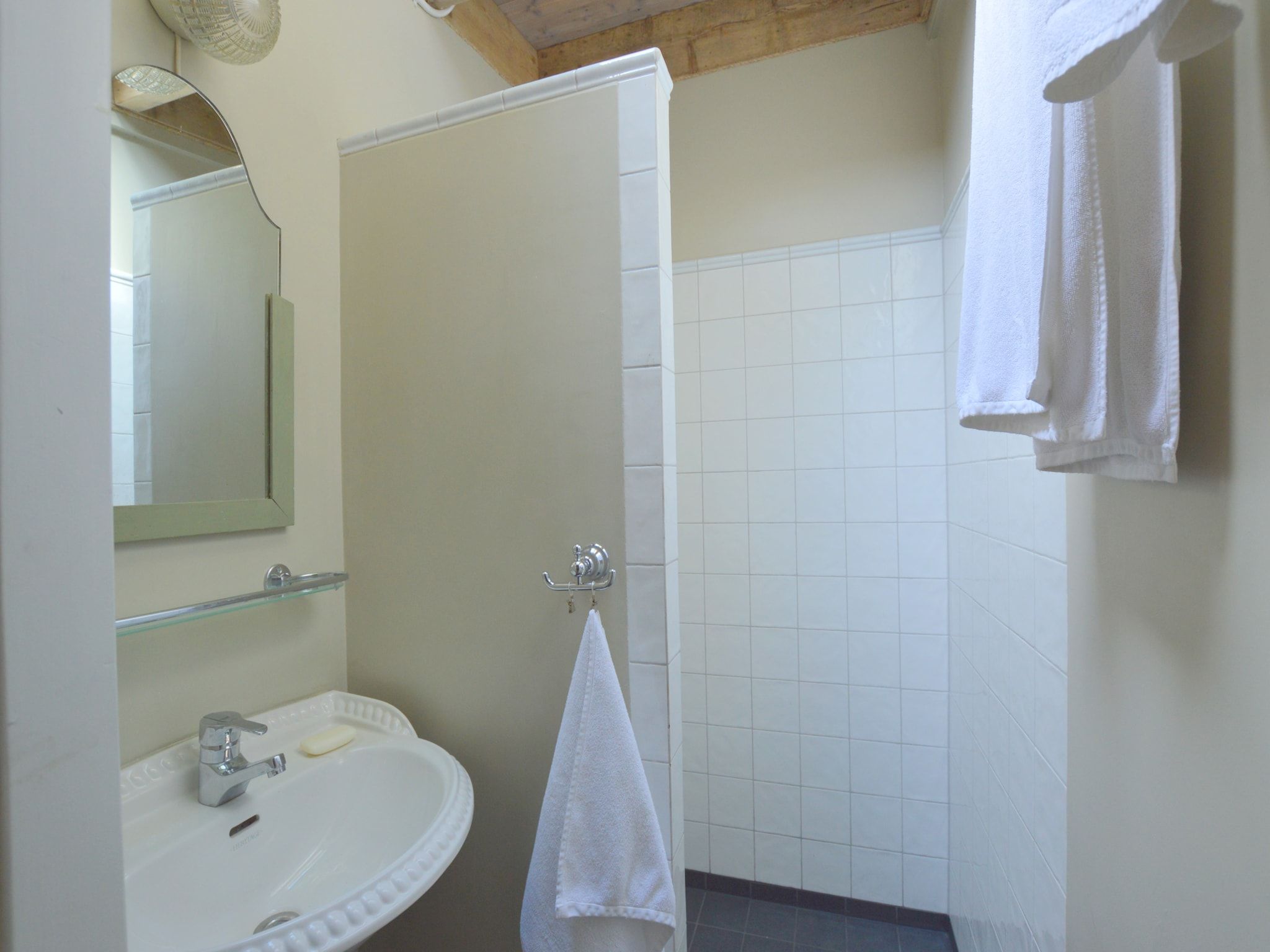 De badkamer van Guesthouse The Old Cottage in Volkel