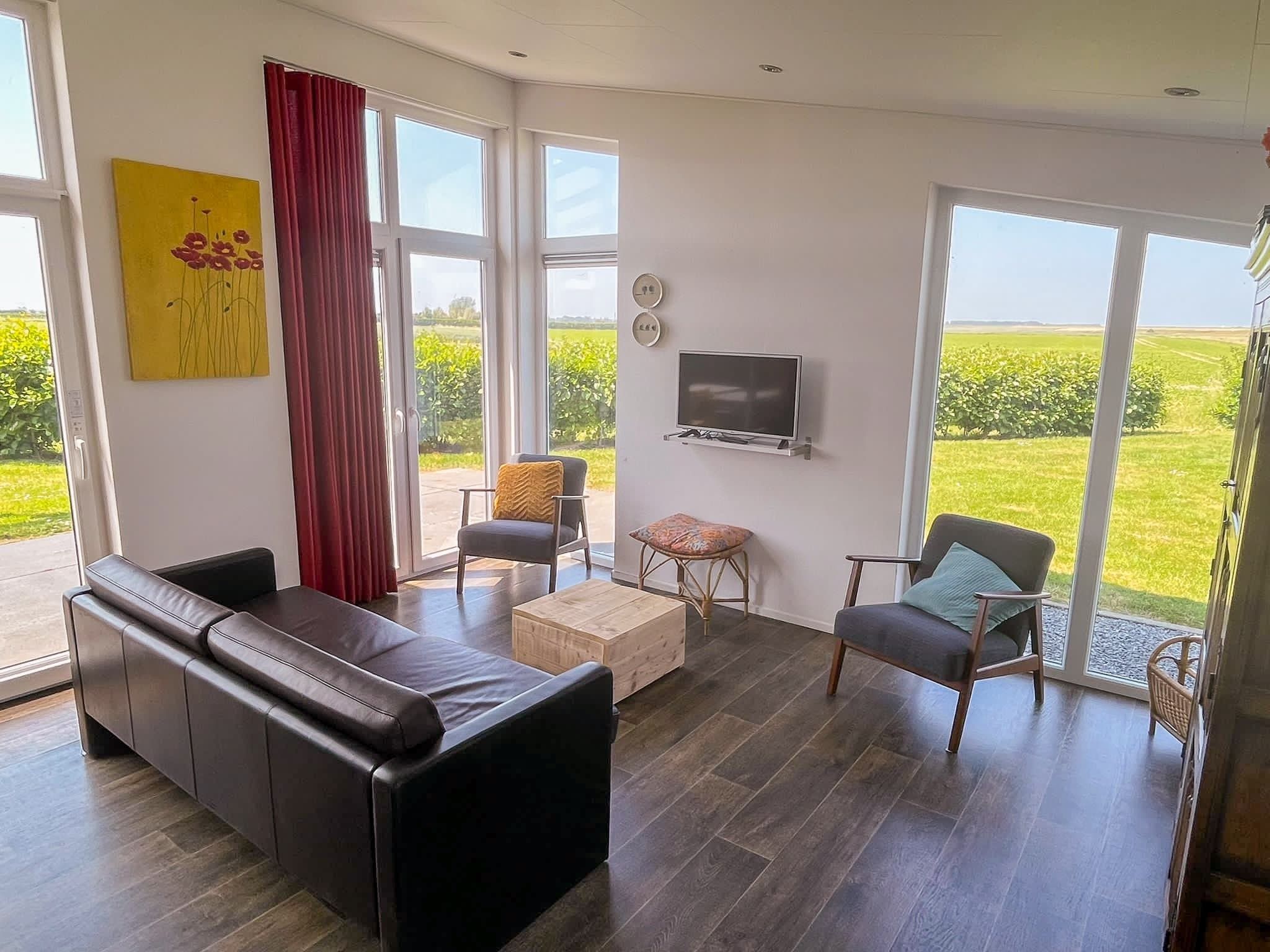 De woonkamer van Water Resort Oosterschelde 51 in Wemeldinge
