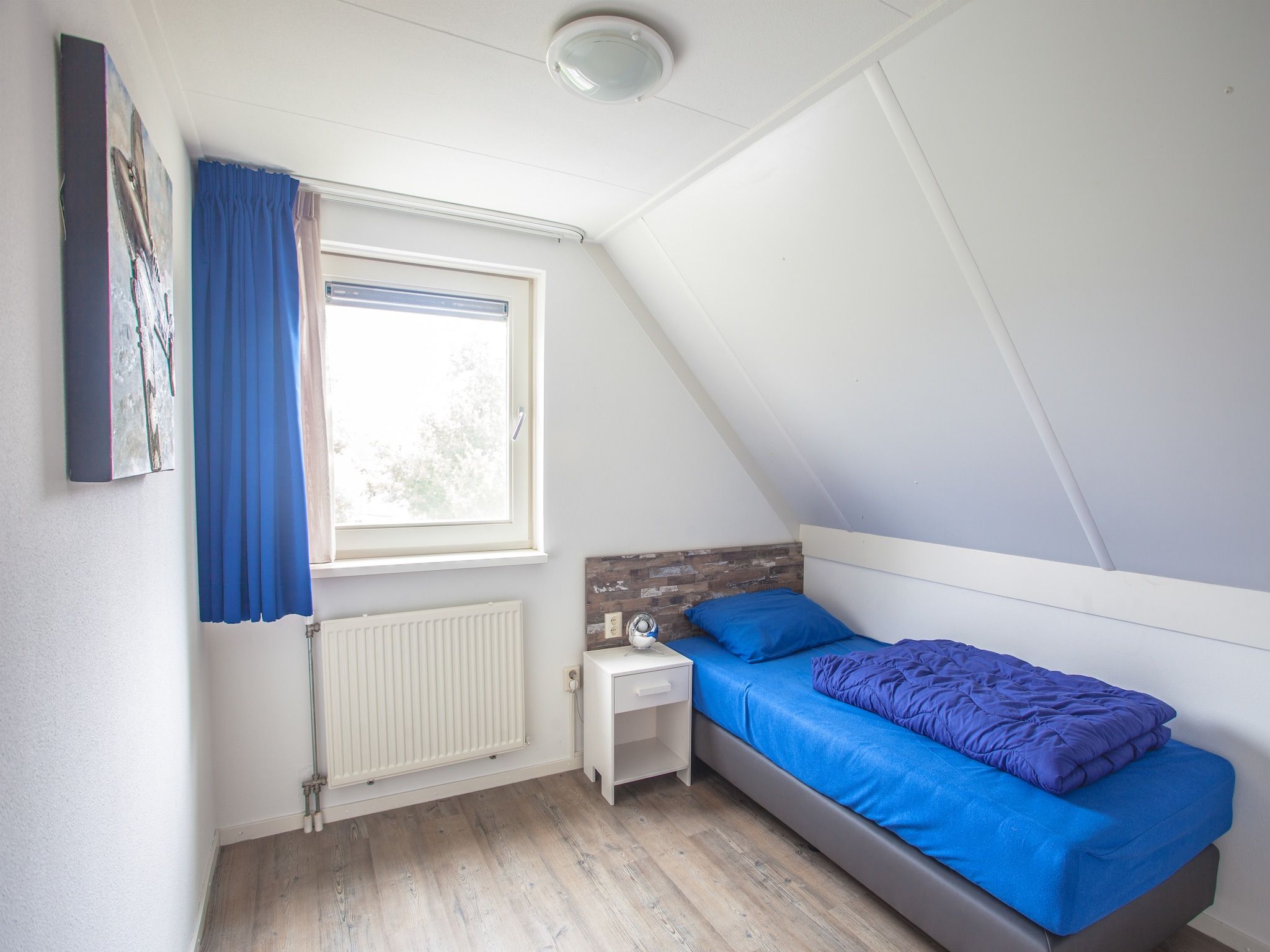 Een slaapkamer van Dijkhuis 6 in Medemblik