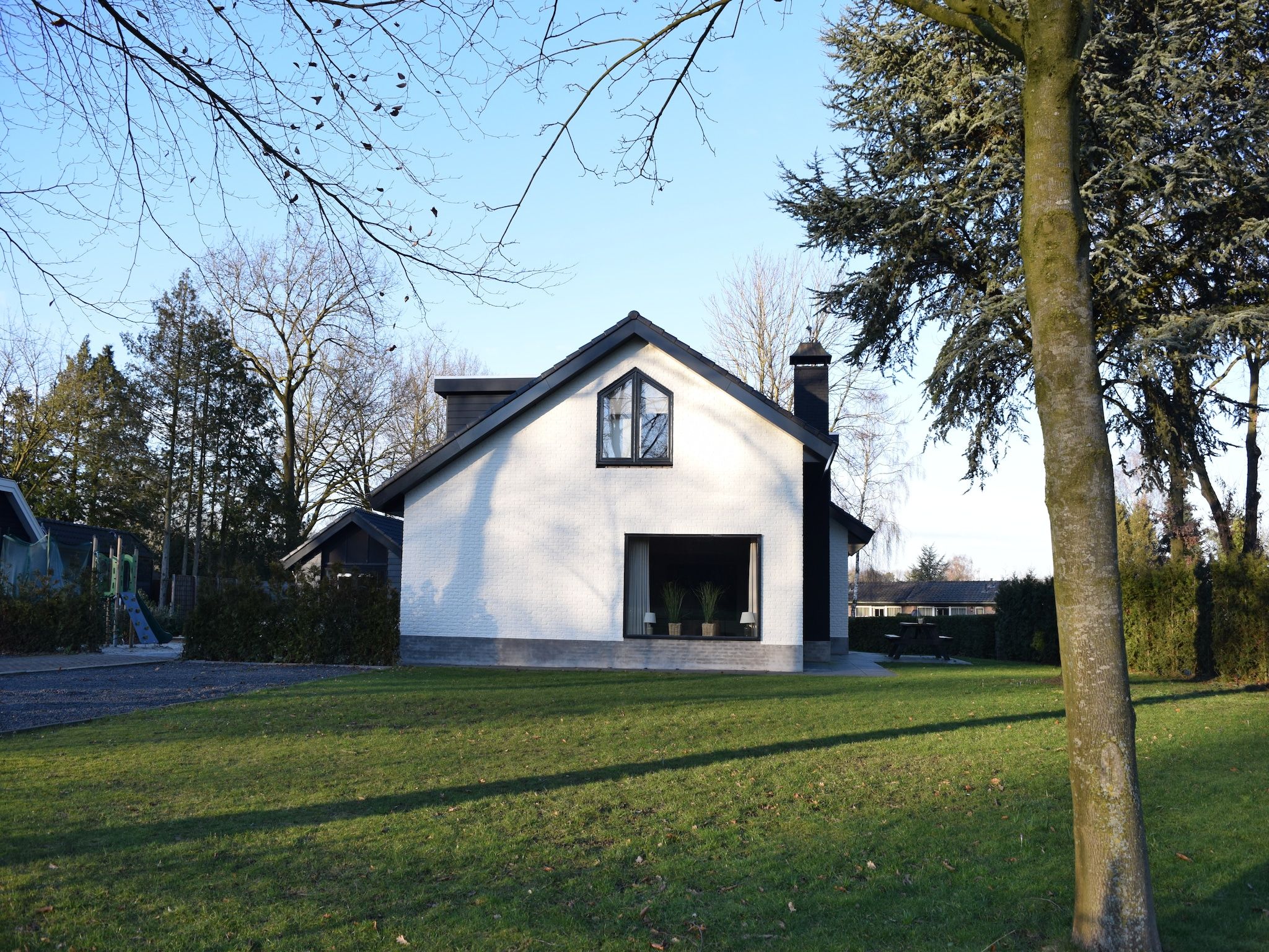 De tuin van Recreatiepark de Boshoek 18 in Voorthuizen