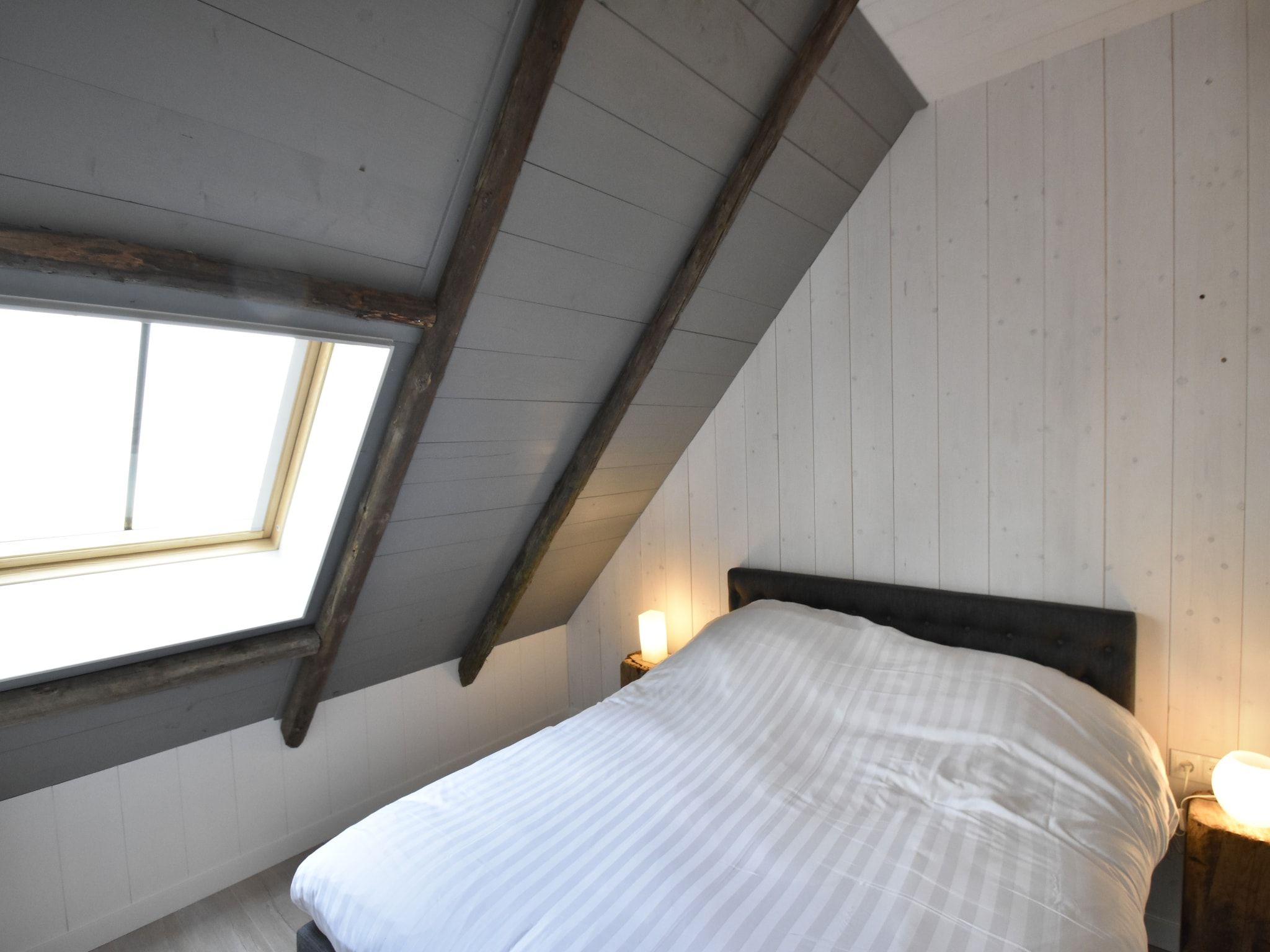 Een slaapkamer van Hazenborgh - Zon in Callantsoog