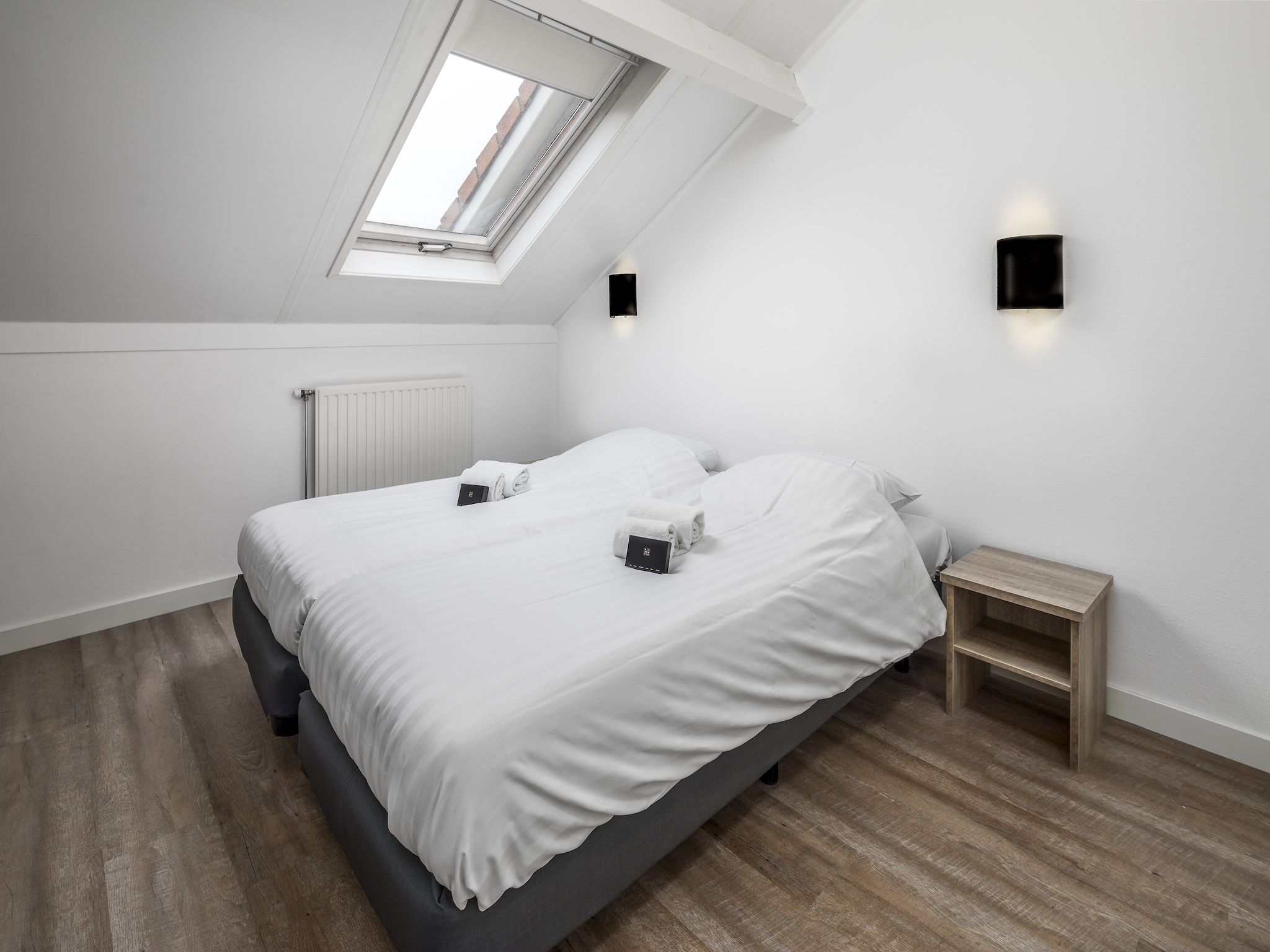 Een slaapkamer van Vakantiepark Soeten Haert 13 in Renesse
