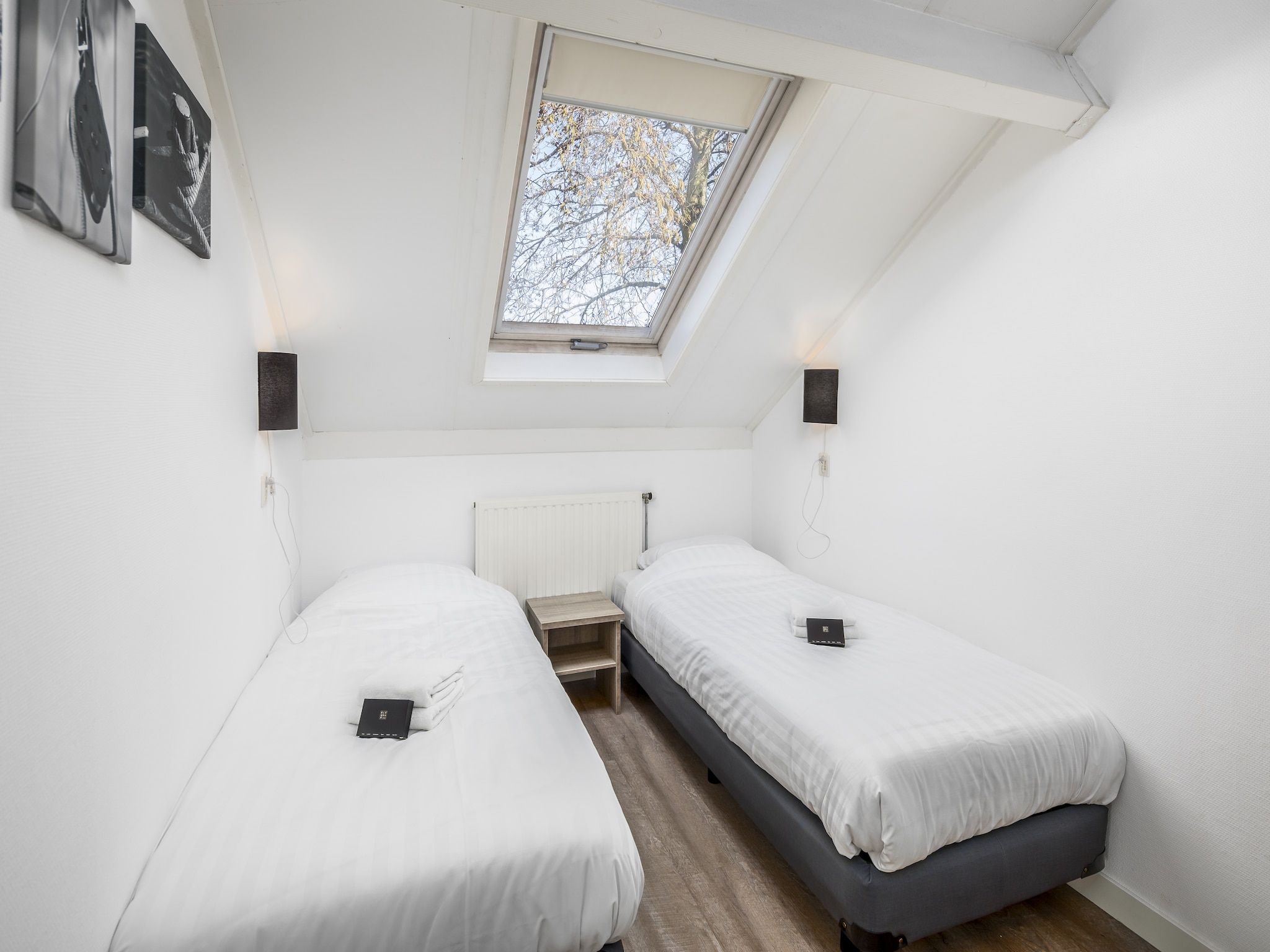 Een slaapkamer van Vakantiepark de Soeten Haert 14 in Renesse