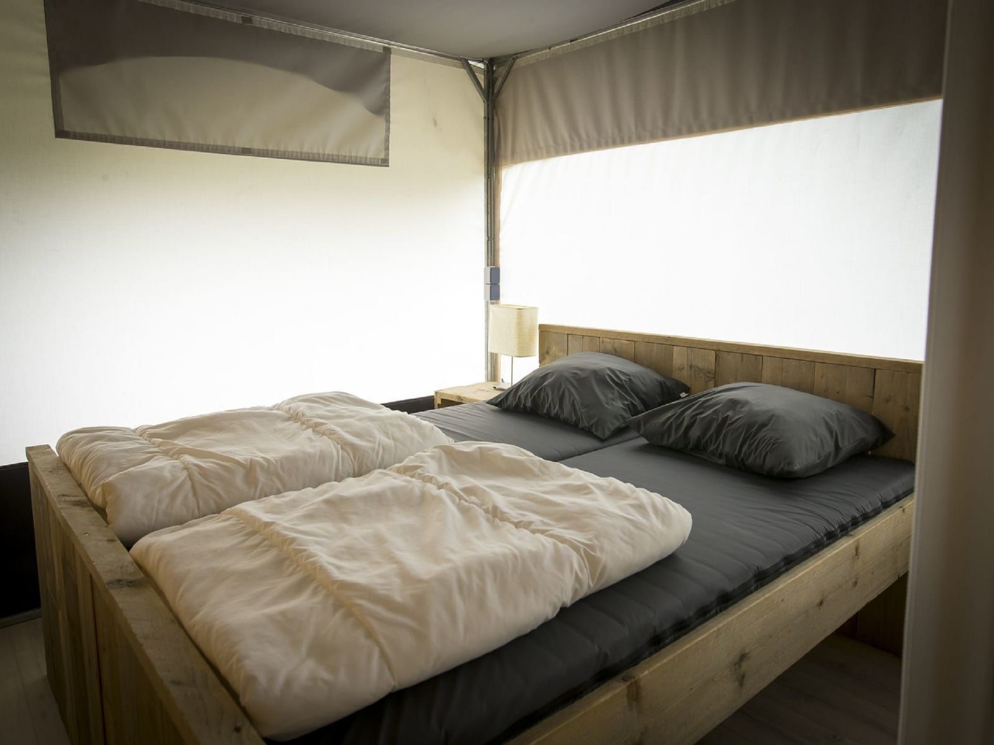 Een slaapkamer van Recreatiepark Duinhoeve 7 in Udenhout