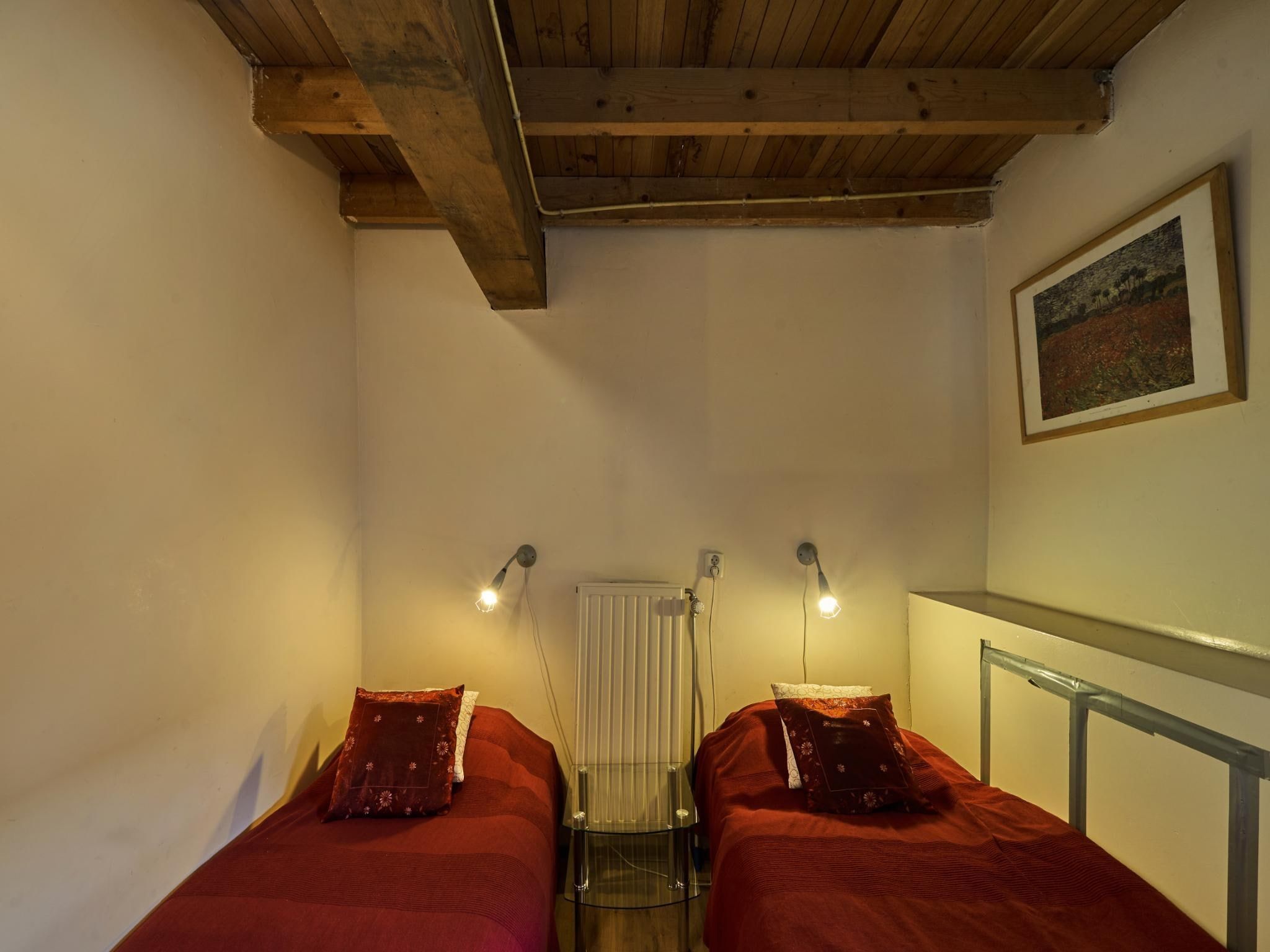Een slaapkamer van Meschermolen 1 in Mesch-Eijsden