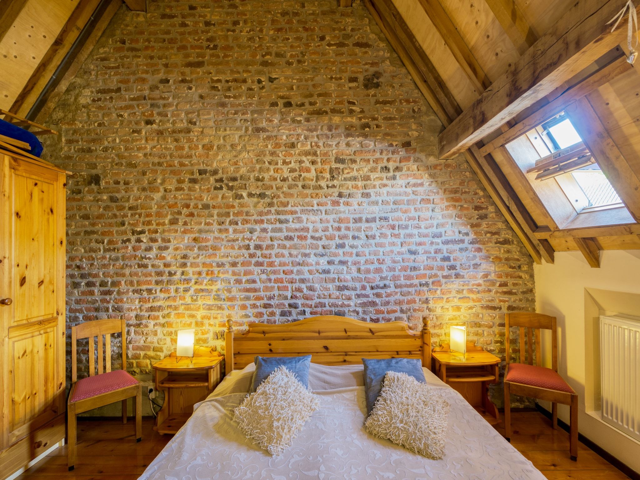 Een slaapkamer van Meschermolen 11 in Mesch-Eijsden