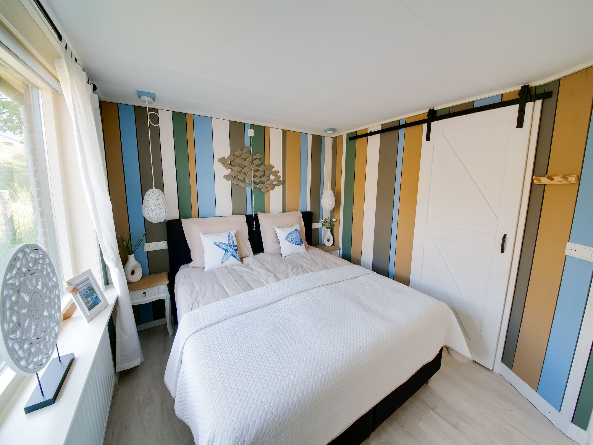 Een slaapkamer van Storm Bries in Callantsoog