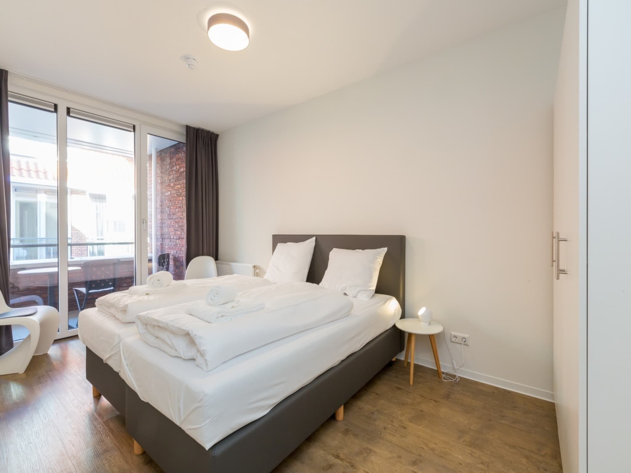 Een slaapkamer van Aparthotel Zoutelande - Luxe 3-persoons comfort appartement in Zoutelande