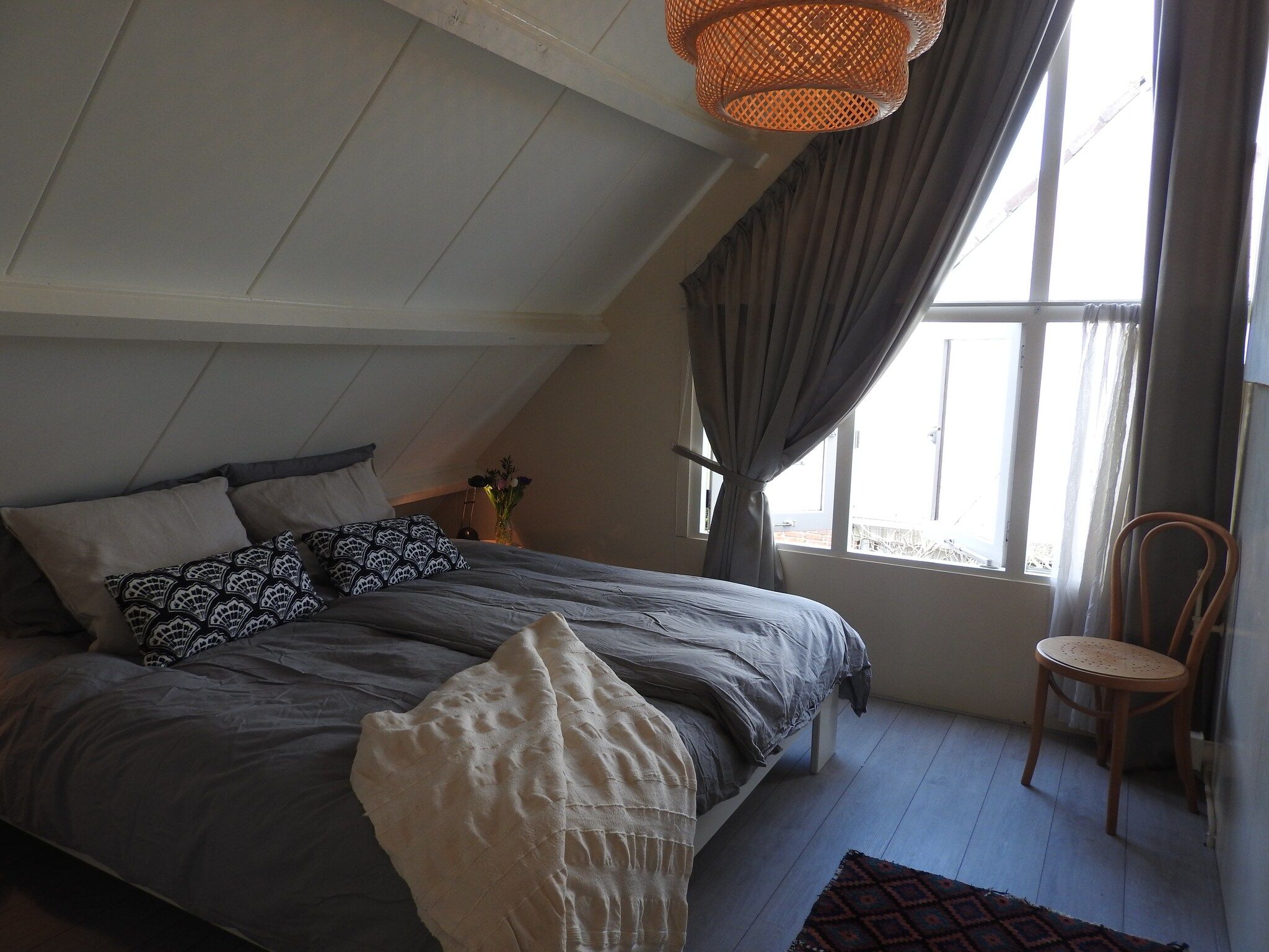 Een slaapkamer van June's Cabin in Noordwijkerhout
