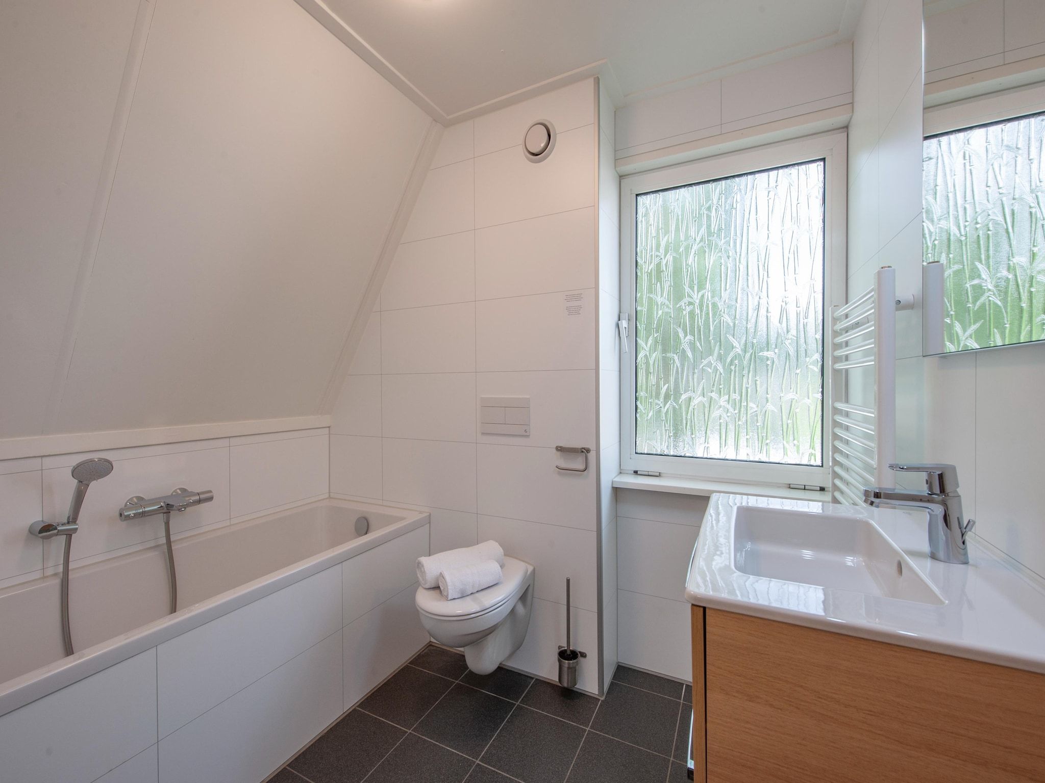 De badkamer van Vakantiepark de Katjeskelder 10 in Oosterhout