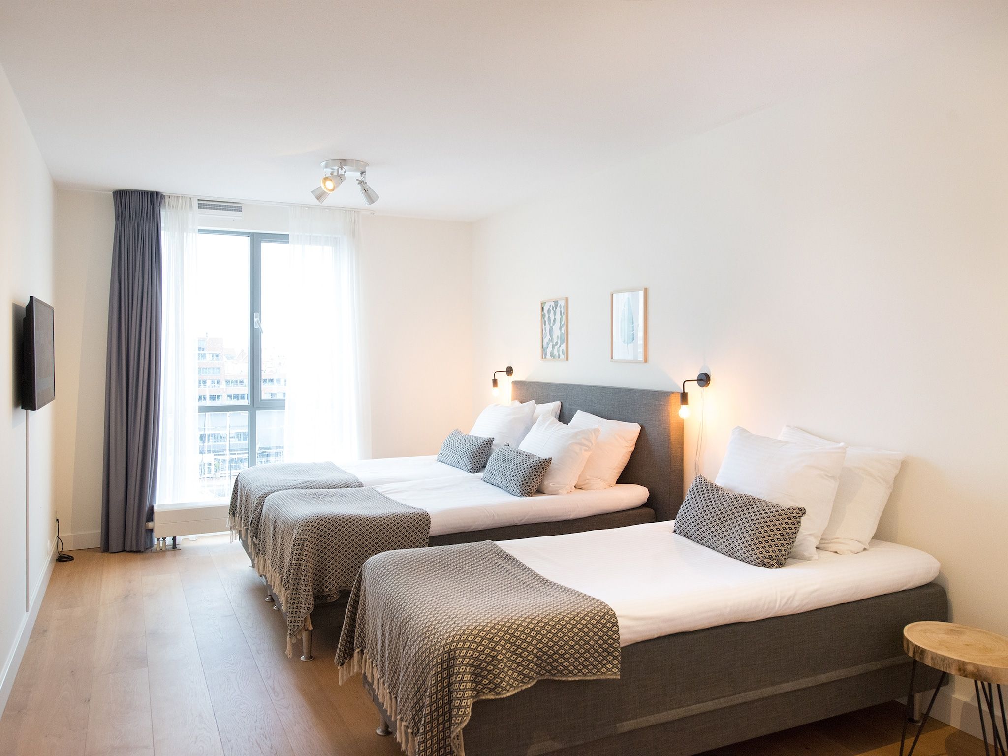 Een slaapkamer van Scheveningen Harbour 70A in Scheveningen