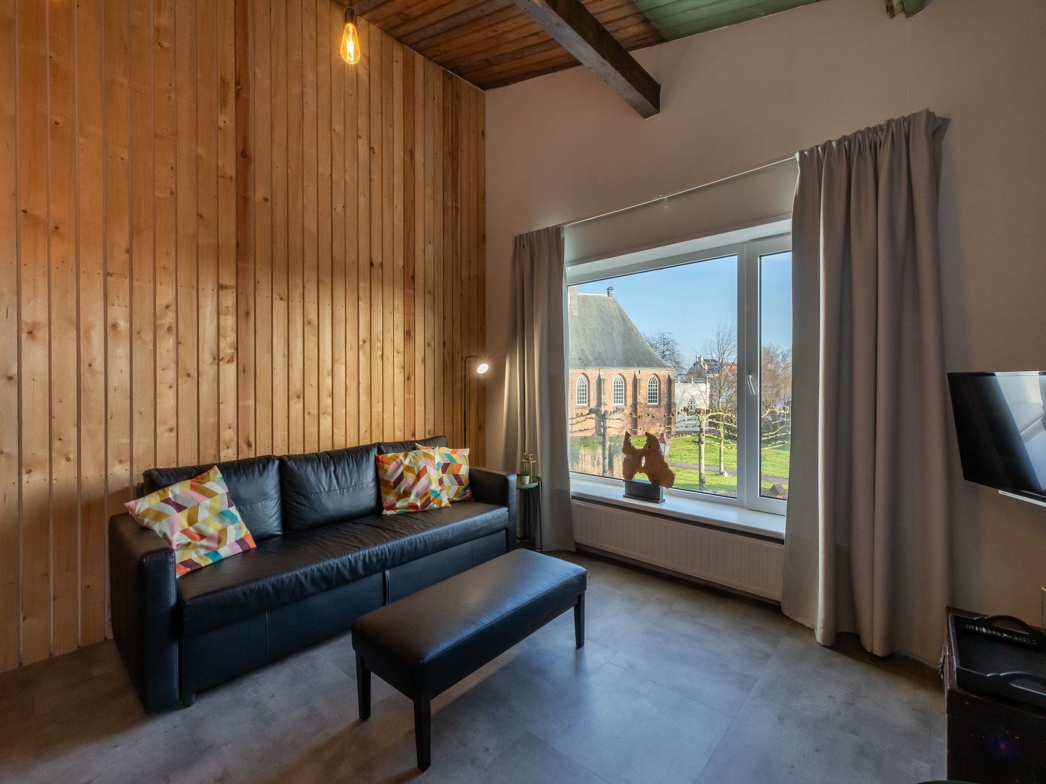 De woonkamer van Pleinzicht 6b in Koudekerke