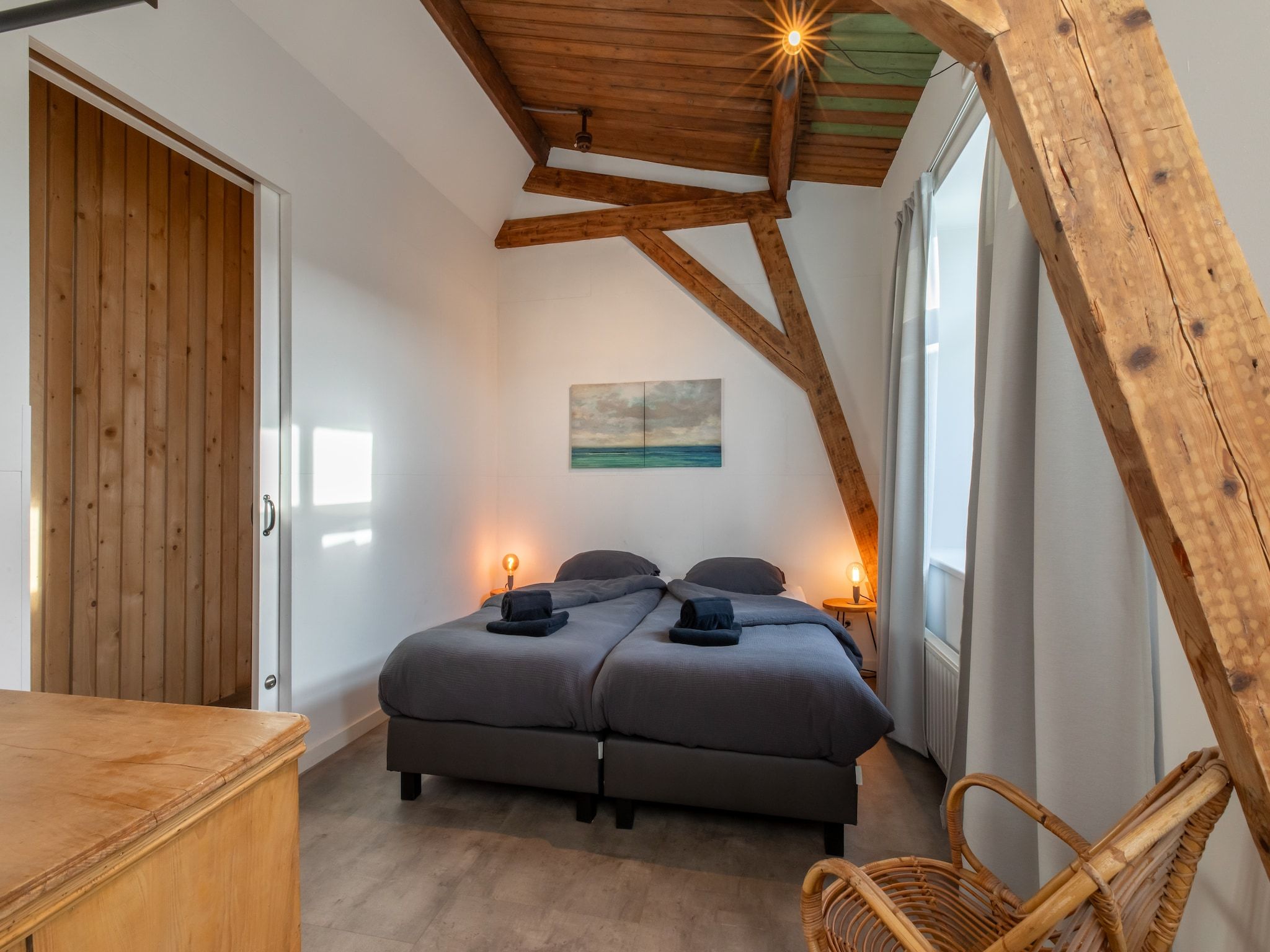 Een slaapkamer van Groepsappartement Pleinzicht in Koudekerke