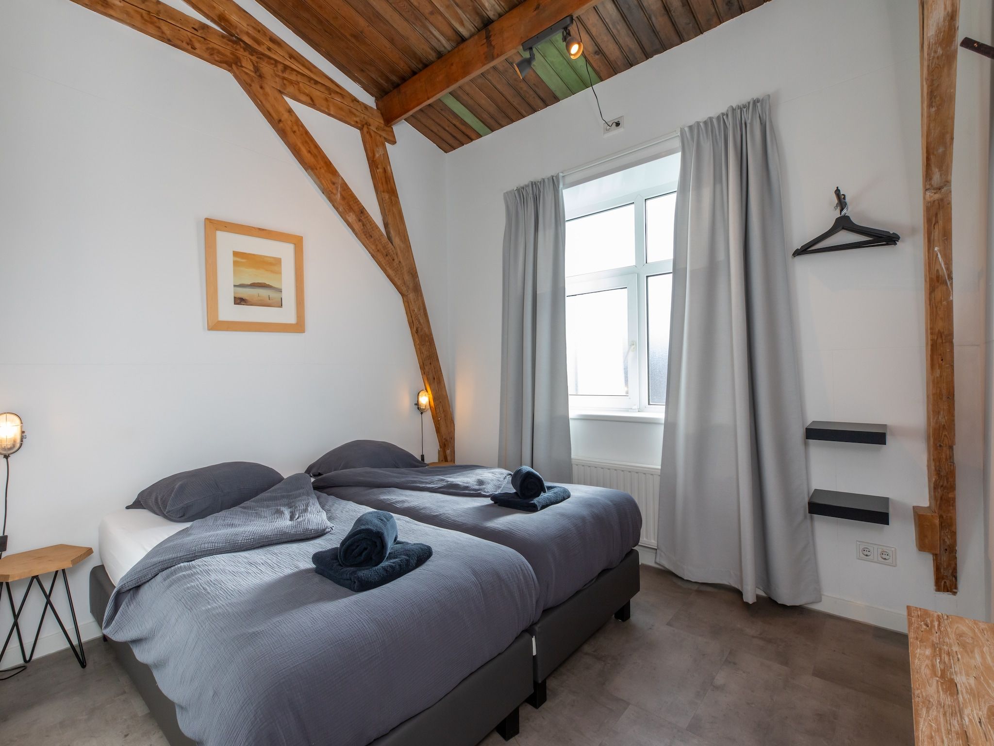 Een slaapkamer van Groepsappartement Pleinzicht in Koudekerke