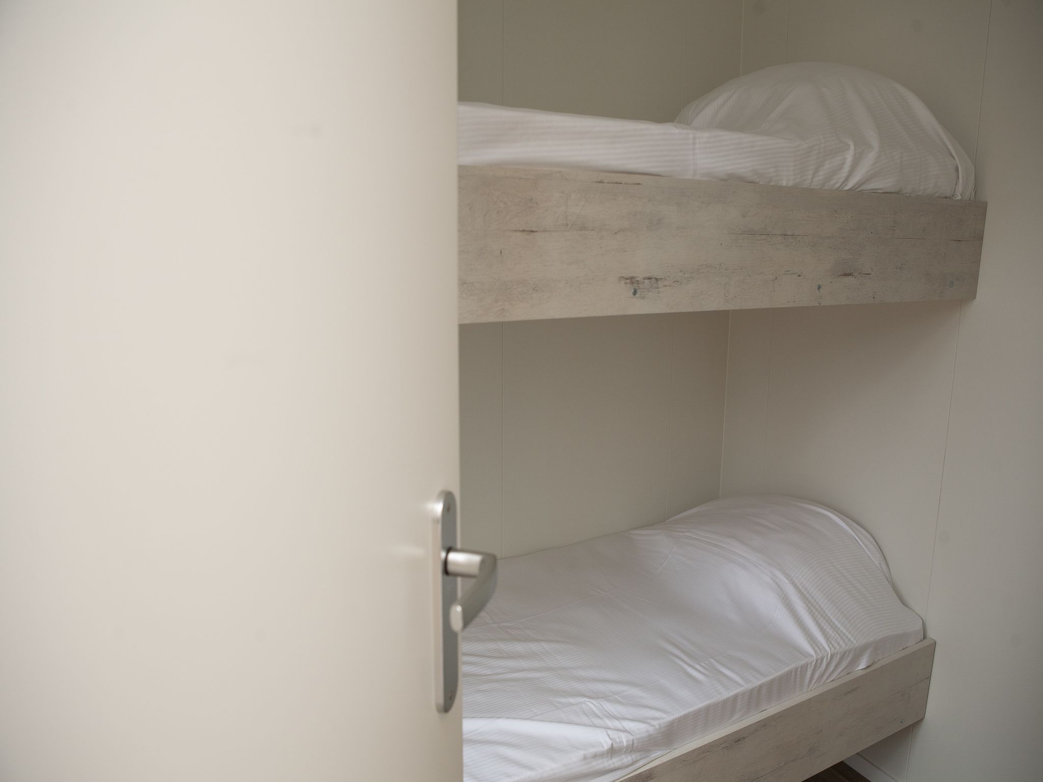 Een slaapkamer van Recreatiepark de Boshoek 21 in Voorthuizen