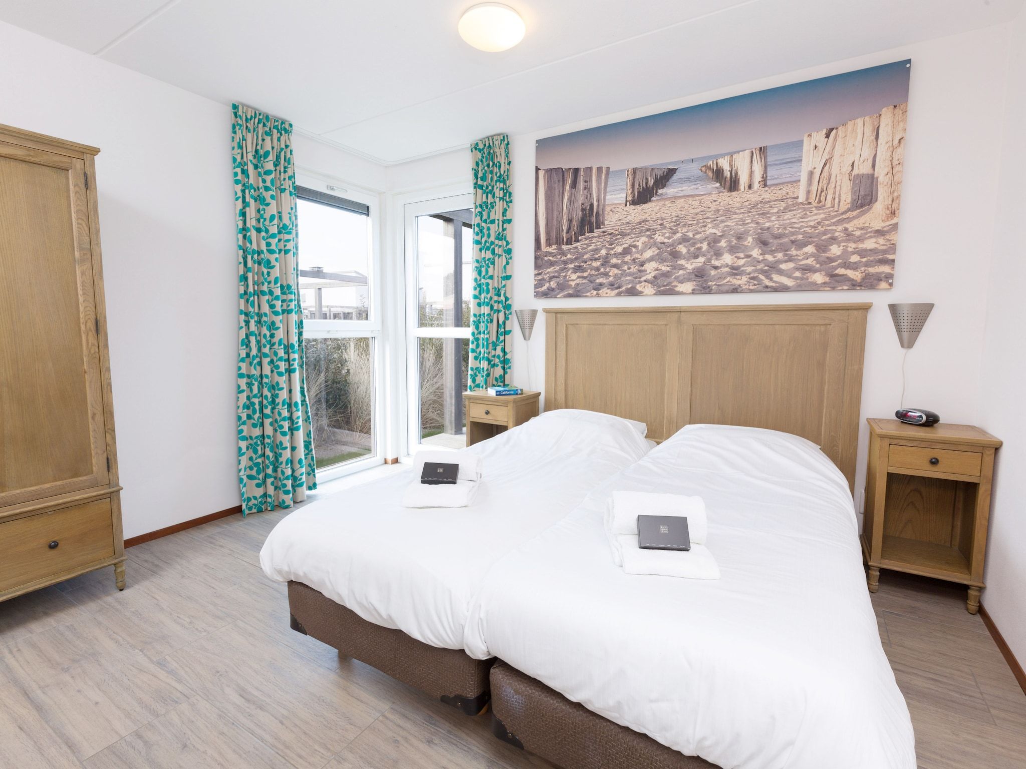 Een slaapkamer van Strandpark Duynhille 1 in Ouddorp