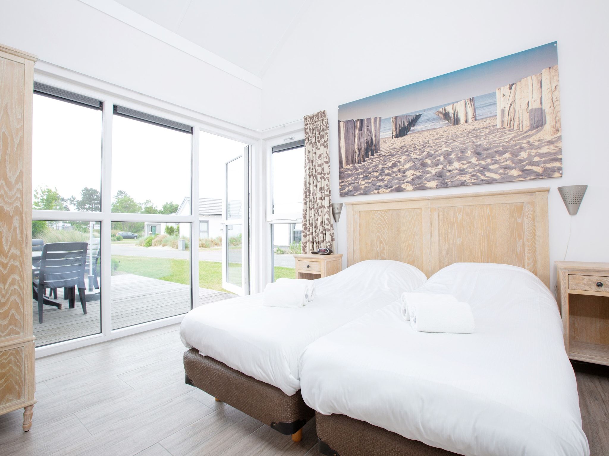 Een slaapkamer van Strandpark Duynhille 2 in Ouddorp