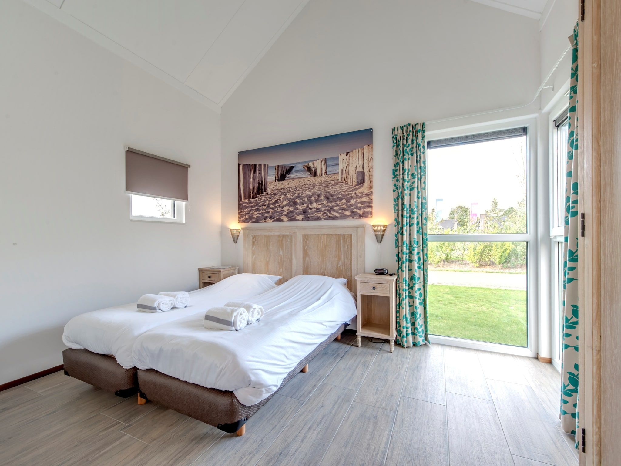 Een slaapkamer van Strandpark Duynhille 5 in Ouddorp