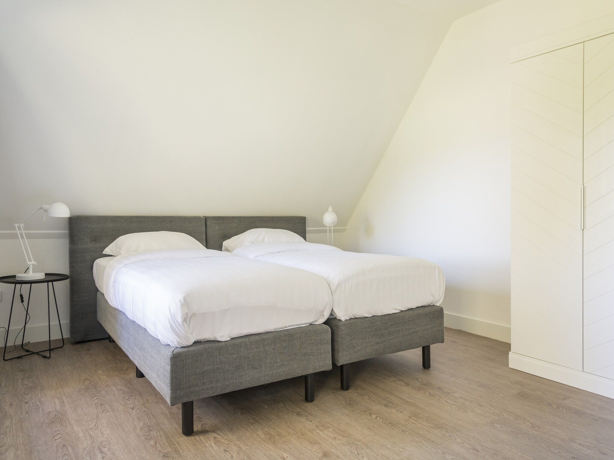 Een slaapkamer van Bouwlust G13 in De Cocksdorp Texel
