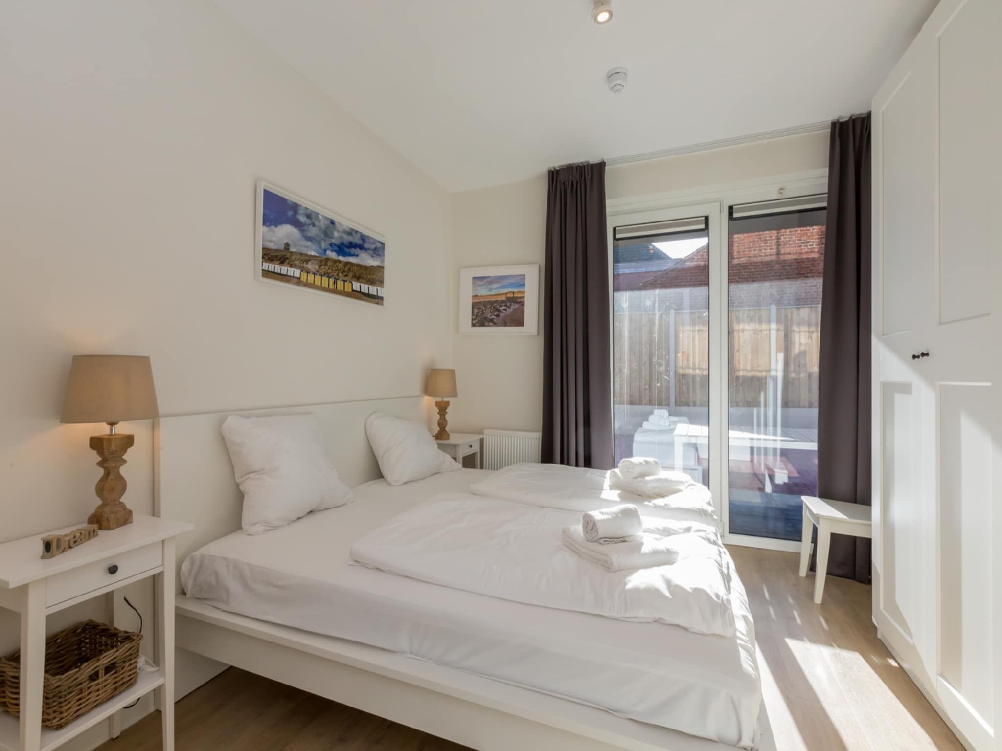 Een slaapkamer van Aparthotel Zoutelande - 5 pers luxe appartement in Zoutelande