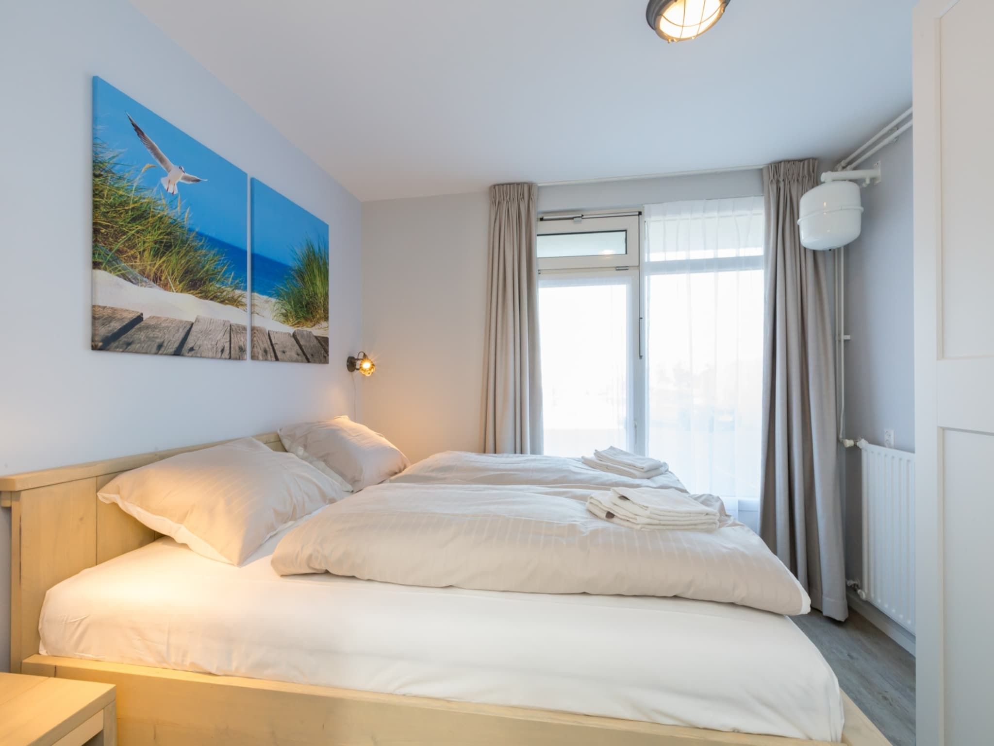 Een slaapkamer van Kurhaus- appartement 5 Zoutelande in Zoutelande