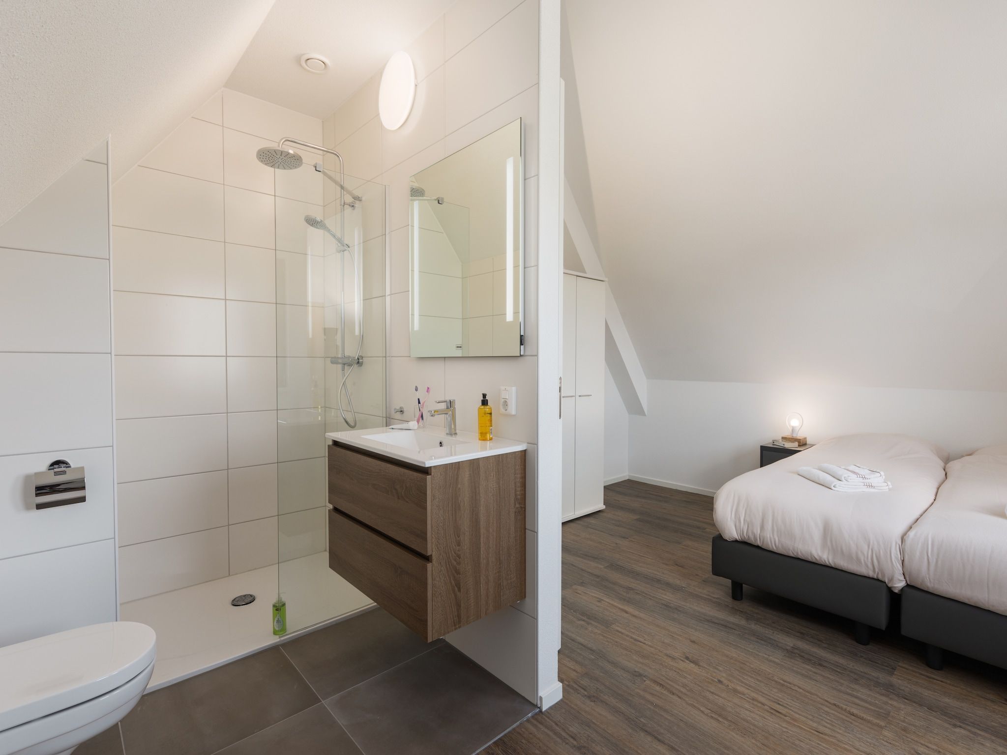 Een slaapkamer van Waterstaete Ossenzijl 3 in Ossenzijl