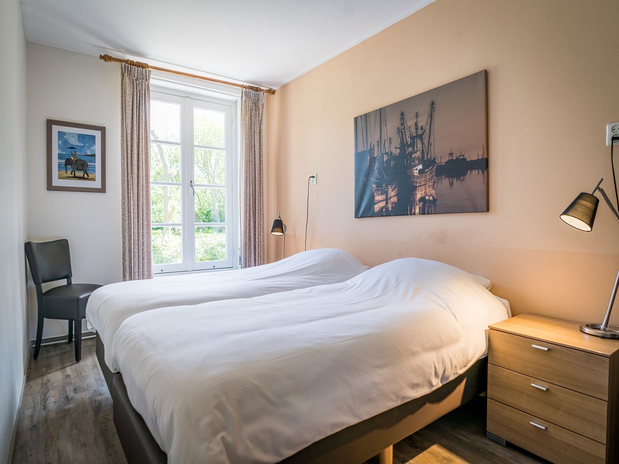 Een slaapkamer van Appartement Hoeve Holland R1 in De Cocksdorp - Texel