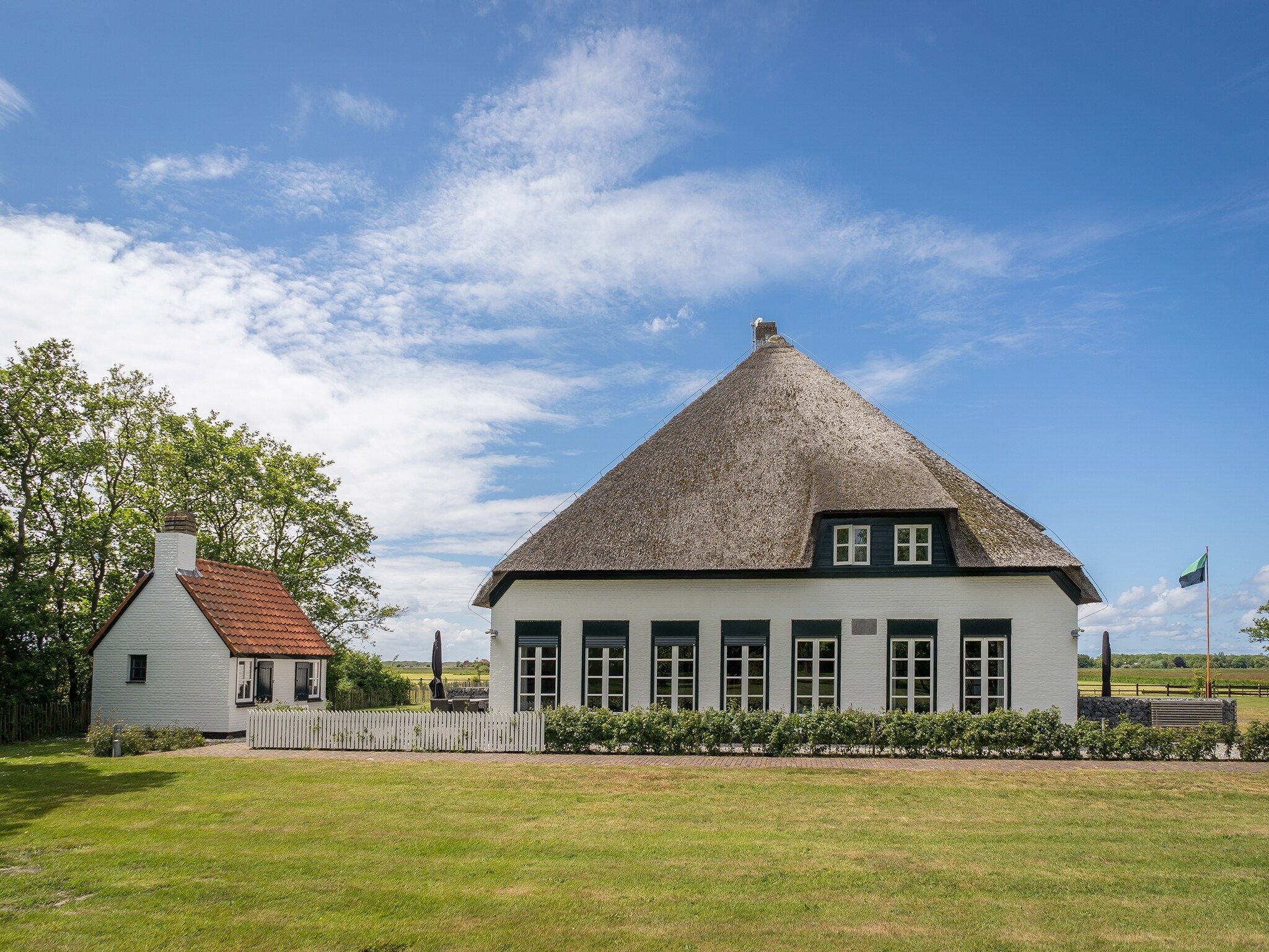 De buitenkant van Appartement Hoeve Holland X7 in De Cocksdorp Texel