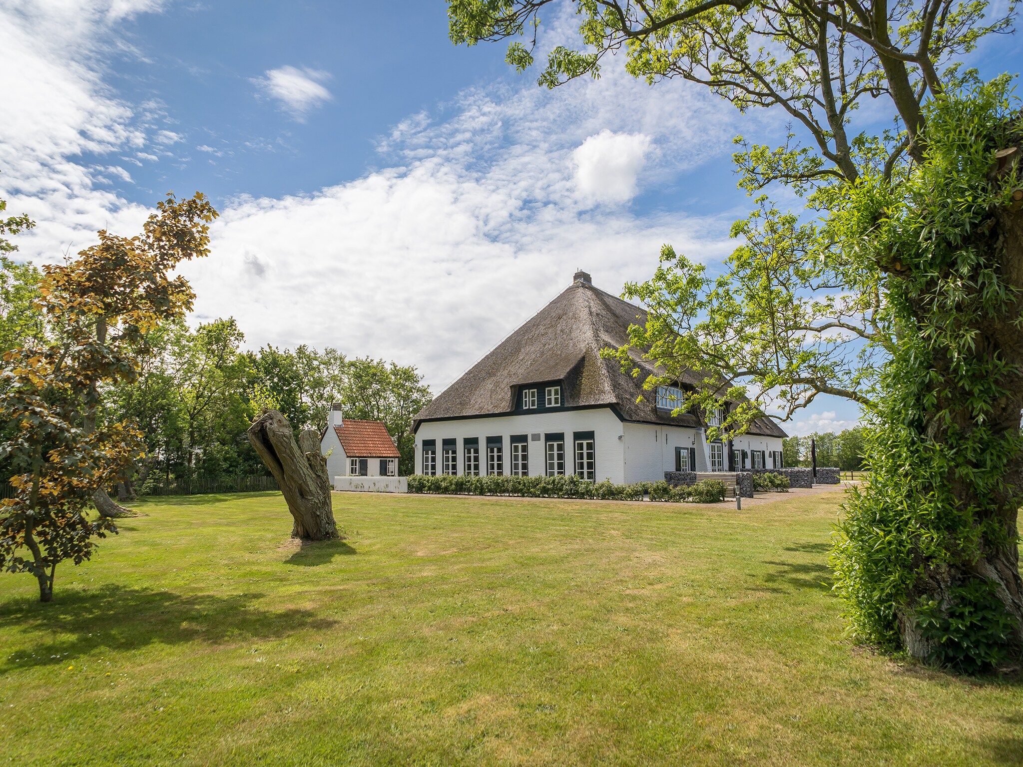 De buitenkant van Appartement Hoeve Holland X7 in De Cocksdorp Texel